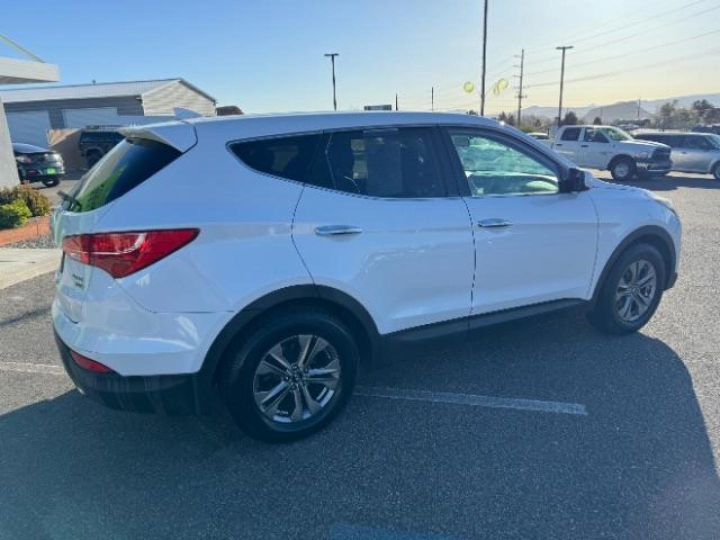 2016 Frost White Pearl /Gray, cloth Hyundai Santa Fe Sport 2.4 AWD (5XYZTDLB2GG) with an 2.4L L4 DOHC 16V engine, 6-Speed Automatic transmission, located at 940 North Main Street, Cedar City, UT, 84720, (435) 628-0023, 37.692936, -113.061897 - Photo#10