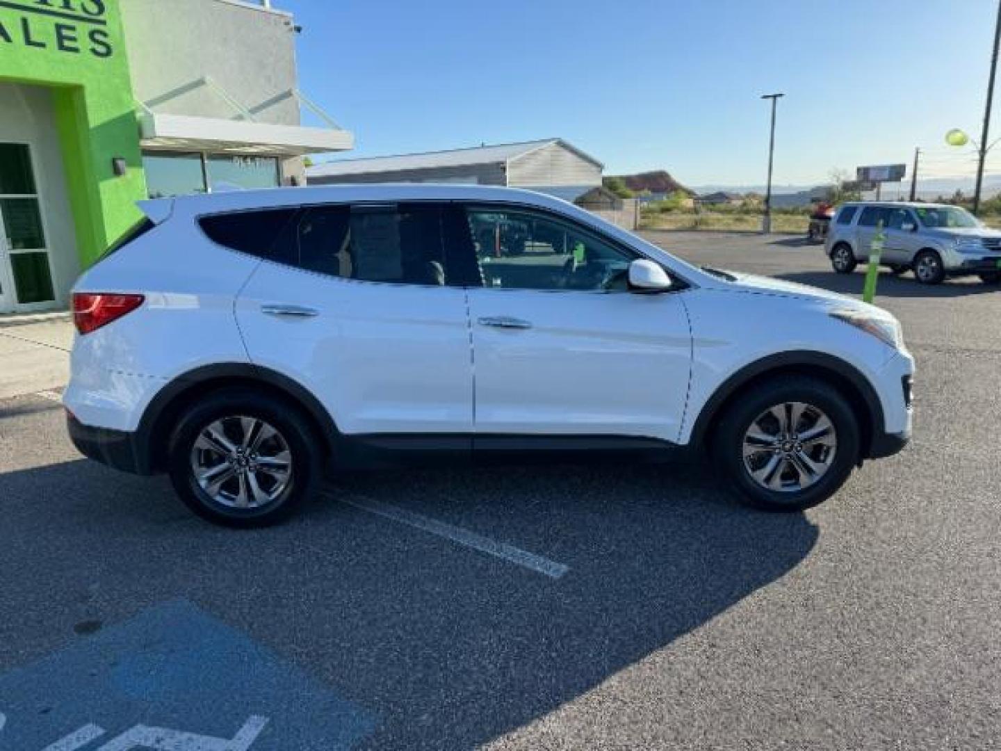 2016 Frost White Pearl /Gray, cloth Hyundai Santa Fe Sport 2.4 AWD (5XYZTDLB2GG) with an 2.4L L4 DOHC 16V engine, 6-Speed Automatic transmission, located at 940 North Main Street, Cedar City, UT, 84720, (435) 628-0023, 37.692936, -113.061897 - Photo#11