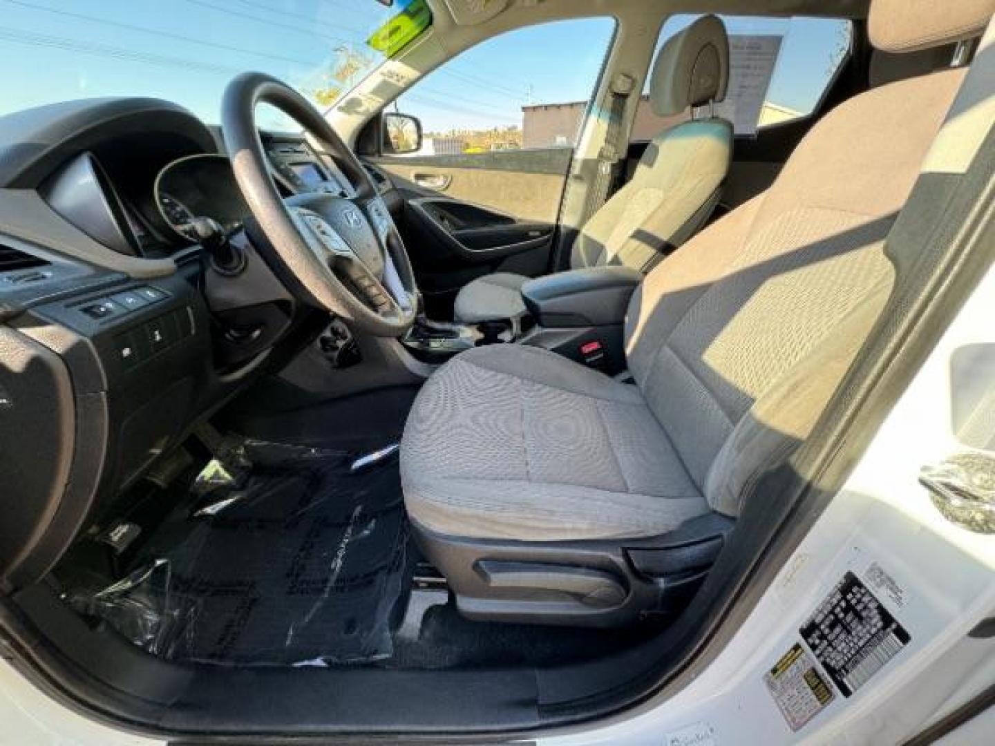 2016 Frost White Pearl /Gray, cloth Hyundai Santa Fe Sport 2.4 AWD (5XYZTDLB2GG) with an 2.4L L4 DOHC 16V engine, 6-Speed Automatic transmission, located at 940 North Main Street, Cedar City, UT, 84720, (435) 628-0023, 37.692936, -113.061897 - Photo#20