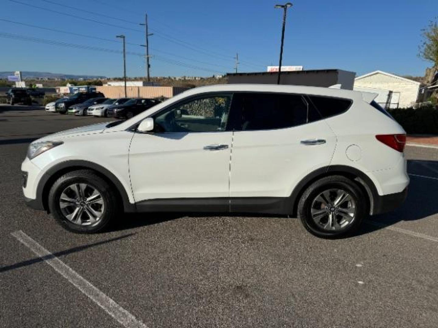 2016 Frost White Pearl /Gray, cloth Hyundai Santa Fe Sport 2.4 AWD (5XYZTDLB2GG) with an 2.4L L4 DOHC 16V engine, 6-Speed Automatic transmission, located at 940 North Main Street, Cedar City, UT, 84720, (435) 628-0023, 37.692936, -113.061897 - Photo#5