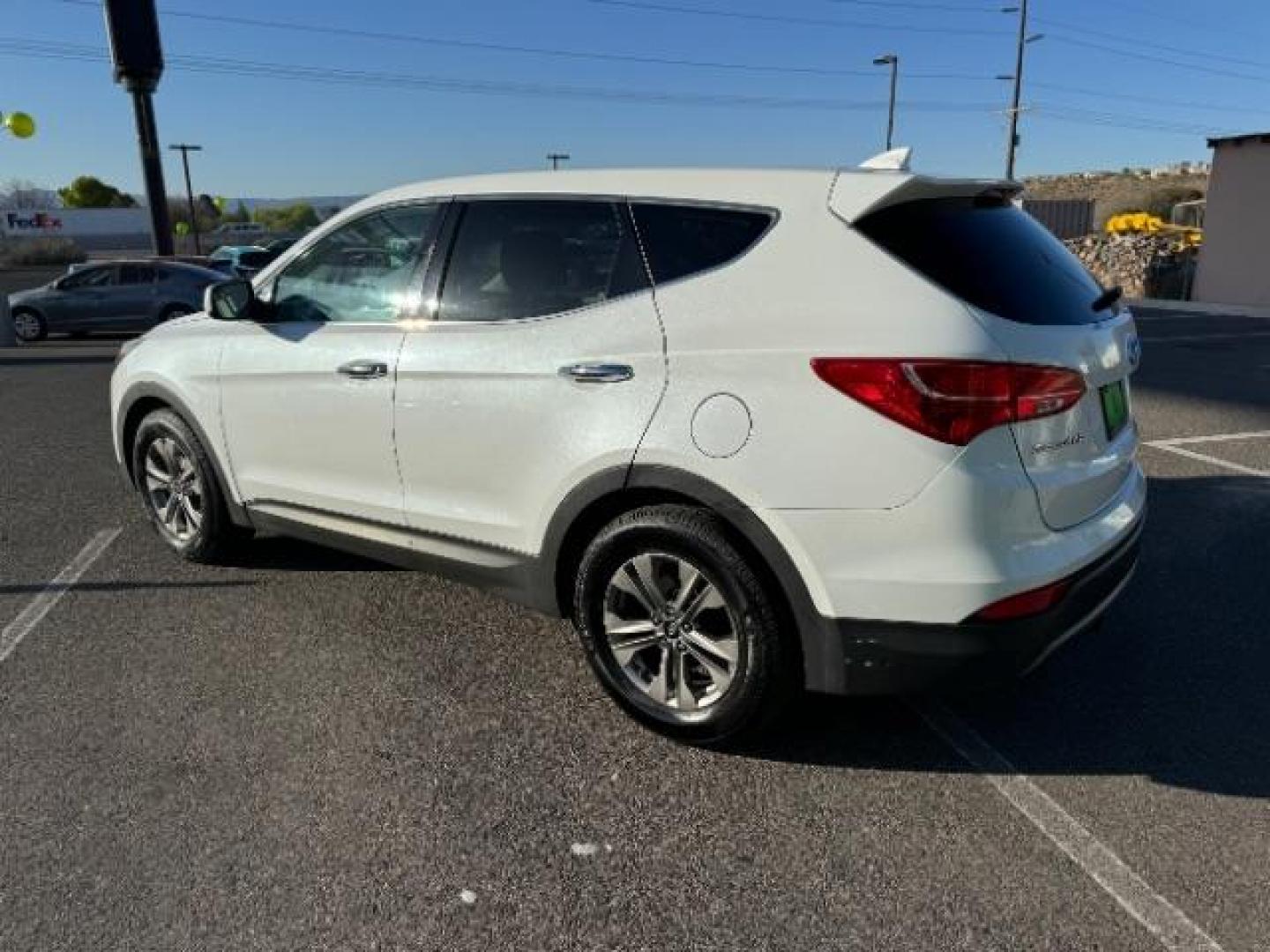 2016 Frost White Pearl /Gray, cloth Hyundai Santa Fe Sport 2.4 AWD (5XYZTDLB2GG) with an 2.4L L4 DOHC 16V engine, 6-Speed Automatic transmission, located at 940 North Main Street, Cedar City, UT, 84720, (435) 628-0023, 37.692936, -113.061897 - Photo#6