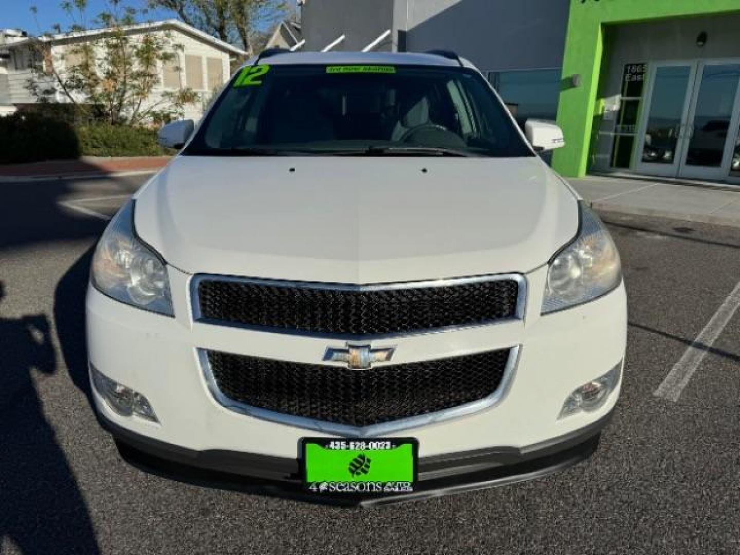 2012 White /Dark Gray Cloth Interior Chevrolet Traverse LT AWD (1GNKVGED9CJ) with an 3.6L V6 DOHC 24V engine, 6-Speed Automatic transmission, located at 940 North Main Street, Cedar City, UT, 84720, (435) 628-0023, 37.692936, -113.061897 - Photo#2