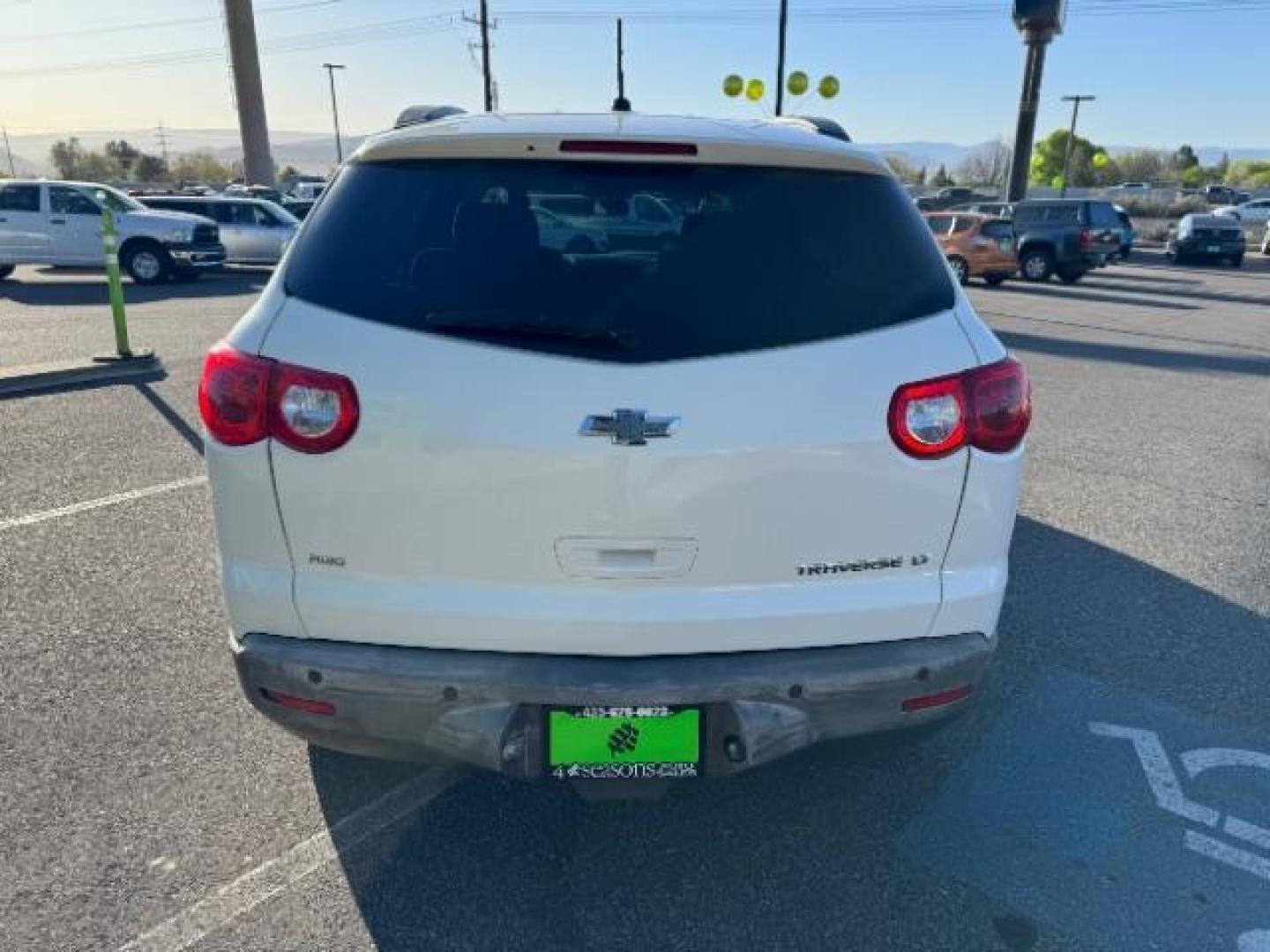 2012 White /Dark Gray Cloth Interior Chevrolet Traverse LT AWD (1GNKVGED9CJ) with an 3.6L V6 DOHC 24V engine, 6-Speed Automatic transmission, located at 940 North Main Street, Cedar City, UT, 84720, (435) 628-0023, 37.692936, -113.061897 - Photo#7