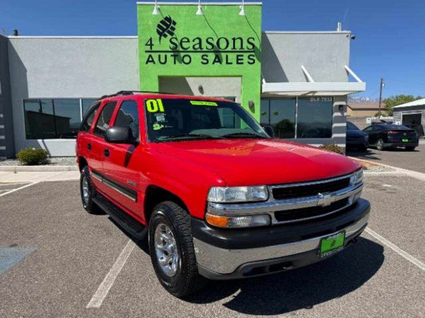 2001 Victory Red /Graphite/Medium Gray Cloth Chevrolet Tahoe 4WD (1GNEK13T31R) with an 5.3L V8 OHV 16V engine, 4-Speed Automatic transmission, located at 1865 East Red Hills Pkwy, St. George, 84770, (435) 628-0023, 37.120850, -113.543640 - Photo#0