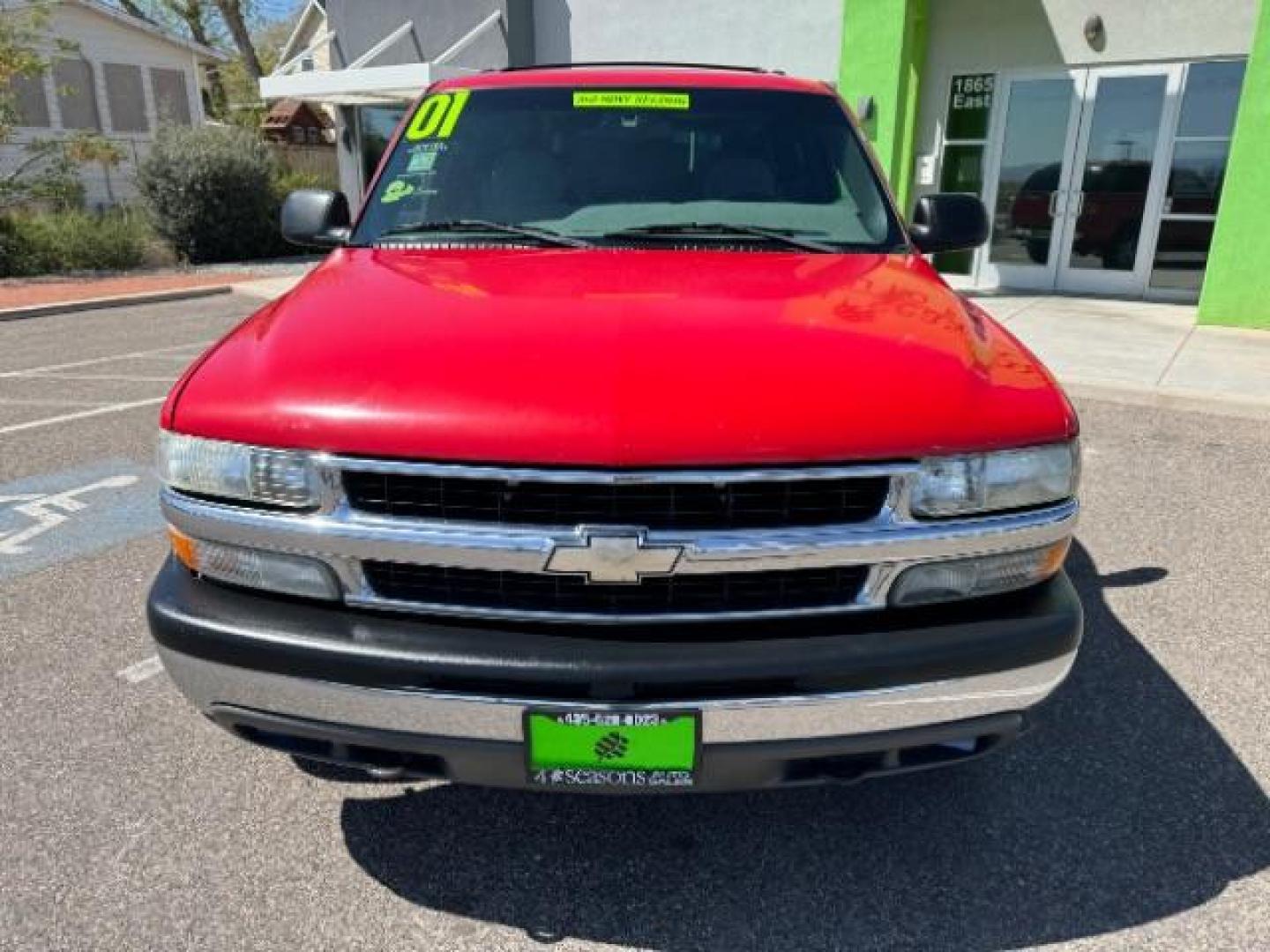 2001 Victory Red /Graphite/Medium Gray Cloth Chevrolet Tahoe 4WD (1GNEK13T31R) with an 5.3L V8 OHV 16V engine, 4-Speed Automatic transmission, located at 1865 East Red Hills Pkwy, St. George, 84770, (435) 628-0023, 37.120850, -113.543640 - Photo#2