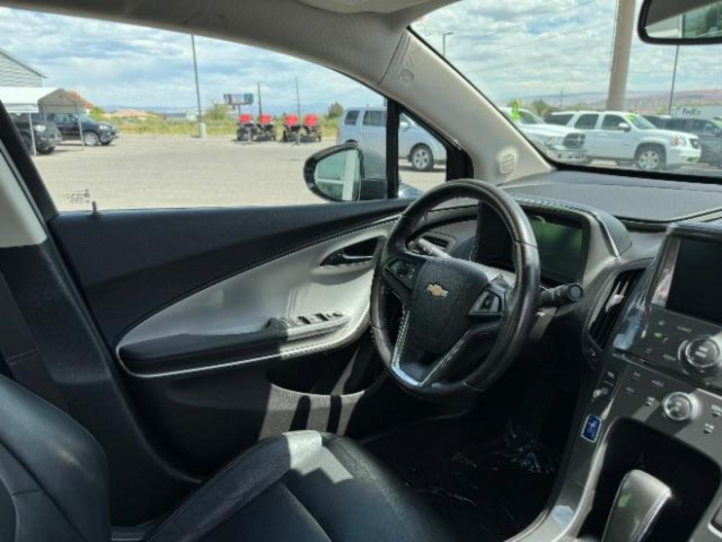 2015 Black /Jet Black/Dark Accents Chevrolet Volt Premium w/ Navigation (1G1RD6E45FU) with an 1.4L L4 DOHC 16V PLUG-IN HYBRID engine, Continuously Variable Transmission transmission, located at 1865 East Red Hills Pkwy, St. George, 84770, (435) 628-0023, 37.120850, -113.543640 - ***This vehicle qualifies for the EV/Hybrid tax rebate of up to $4,000*** We are setup with the IRS to recieve direct payments within 72 hours. We file the rebate online with IRS and can credit it to your down payment, reduce the sales price OR give you cashback!! These cars will not last and can o - Photo#32