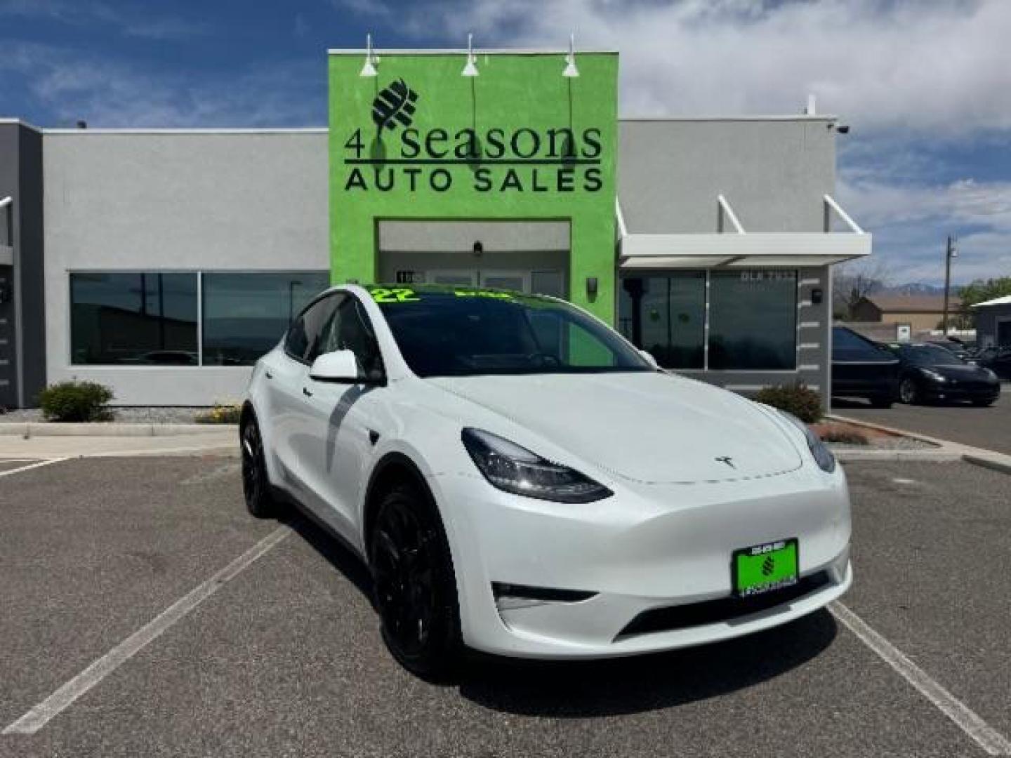 2022 Pearl White Multi-Coat /All Black Tesla Model Y Long Range (7SAYGDEE4NF) with an ELECTRIC engine, 1-Speed Automatic transmission, located at 1865 East Red Hills Pkwy, St. George, 84770, (435) 628-0023, 37.120850, -113.543640 - SOLD - But we take special orders for teslas. Call us to talk about current availability and pricing. All wheel drive long range Model Y in excellent condition. Still have 120k mile warranty on battery and motor. Gets 300+ miles on a full charge. Many of our Ev's/ Hybrids qualify for the IRS $4k - Photo#0