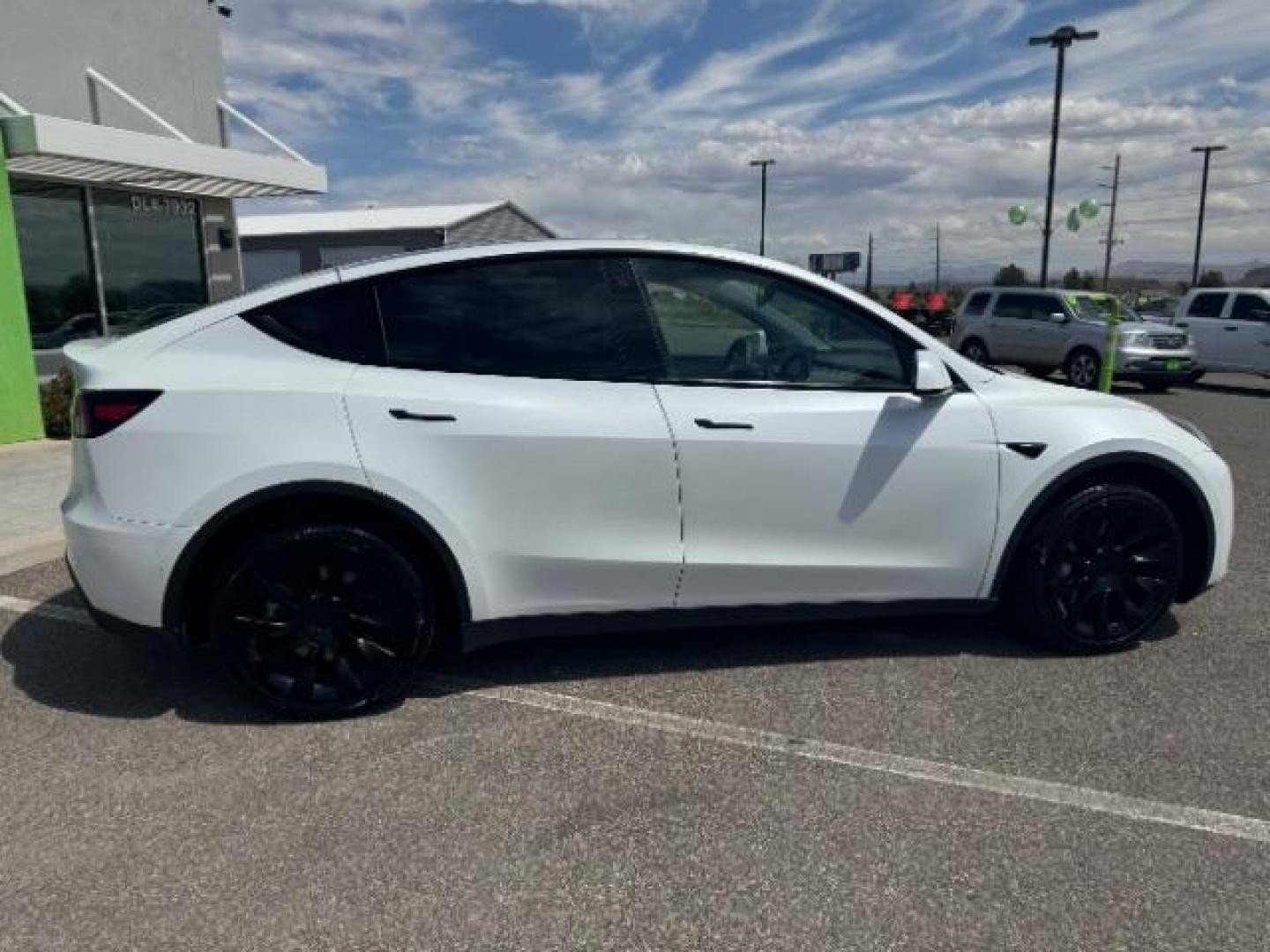 2022 Pearl White Multi-Coat /All Black Tesla Model Y Long Range (7SAYGDEE4NF) with an ELECTRIC engine, 1-Speed Automatic transmission, located at 1865 East Red Hills Pkwy, St. George, 84770, (435) 628-0023, 37.120850, -113.543640 - SOLD - But we take special orders for teslas. Call us to talk about current availability and pricing. All wheel drive long range Model Y in excellent condition. Still have 120k mile warranty on battery and motor. Gets 300+ miles on a full charge. Many of our Ev's/ Hybrids qualify for the IRS $4k - Photo#9