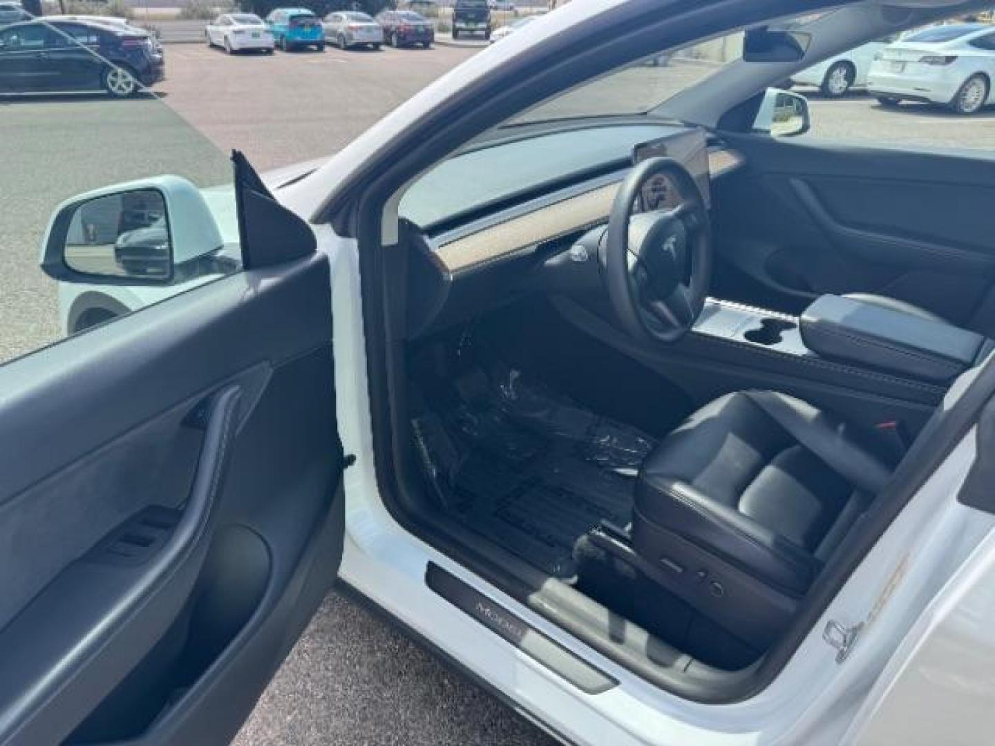 2022 Pearl White Multi-Coat /All Black Tesla Model Y Long Range (7SAYGDEE4NF) with an ELECTRIC engine, 1-Speed Automatic transmission, located at 1865 East Red Hills Pkwy, St. George, 84770, (435) 628-0023, 37.120850, -113.543640 - SOLD - But we take special orders for teslas. Call us to talk about current availability and pricing. All wheel drive long range Model Y in excellent condition. Still have 120k mile warranty on battery and motor. Gets 300+ miles on a full charge. Many of our Ev's/ Hybrids qualify for the IRS $4k - Photo#16