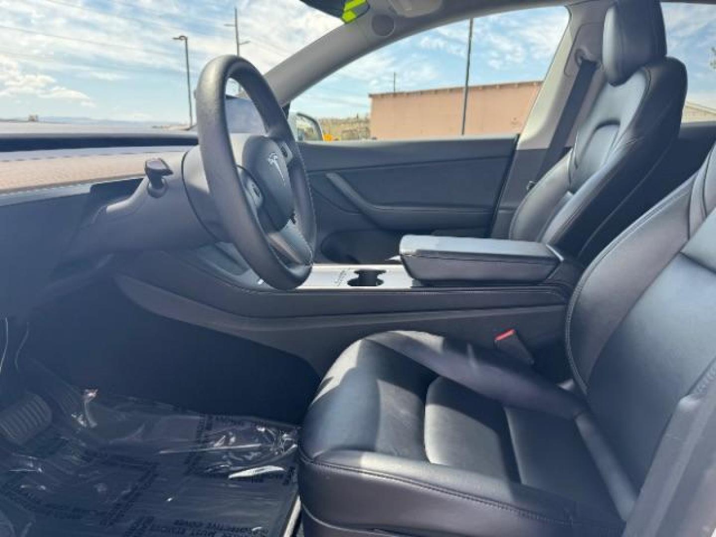 2022 Pearl White Multi-Coat /All Black Tesla Model Y Long Range (7SAYGDEE4NF) with an ELECTRIC engine, 1-Speed Automatic transmission, located at 1865 East Red Hills Pkwy, St. George, 84770, (435) 628-0023, 37.120850, -113.543640 - SOLD - But we take special orders for teslas. Call us to talk about current availability and pricing. All wheel drive long range Model Y in excellent condition. Still have 120k mile warranty on battery and motor. Gets 300+ miles on a full charge. Many of our Ev's/ Hybrids qualify for the IRS $4k - Photo#17