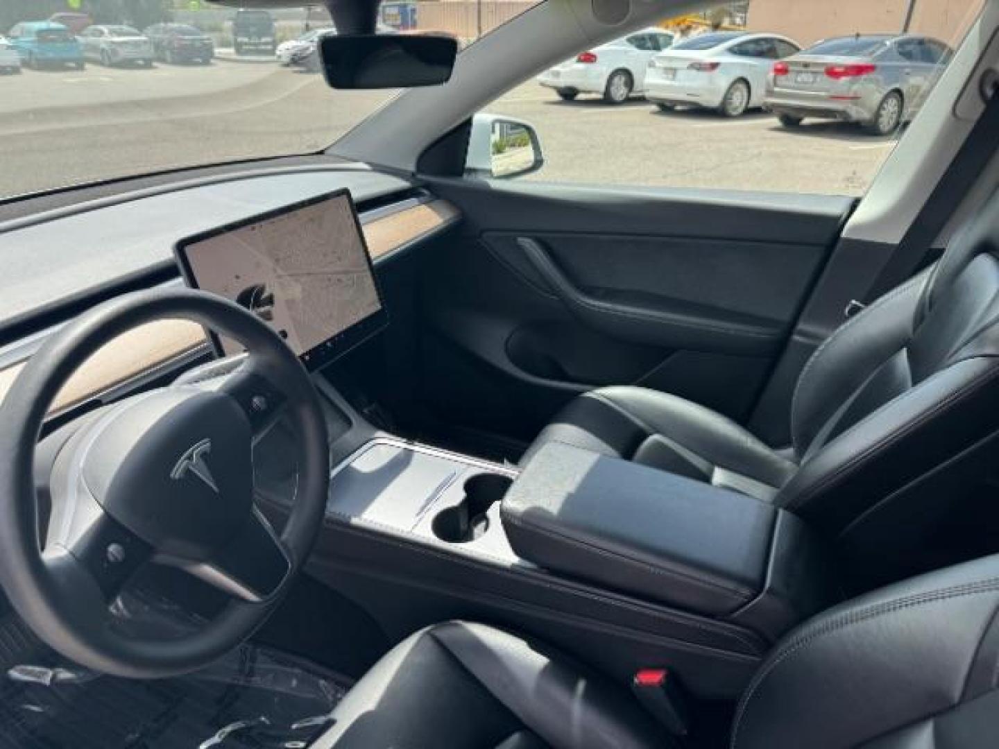 2022 Pearl White Multi-Coat /All Black Tesla Model Y Long Range (7SAYGDEE4NF) with an ELECTRIC engine, 1-Speed Automatic transmission, located at 1865 East Red Hills Pkwy, St. George, 84770, (435) 628-0023, 37.120850, -113.543640 - SOLD - But we take special orders for teslas. Call us to talk about current availability and pricing. All wheel drive long range Model Y in excellent condition. Still have 120k mile warranty on battery and motor. Gets 300+ miles on a full charge. Many of our Ev's/ Hybrids qualify for the IRS $4k - Photo#23