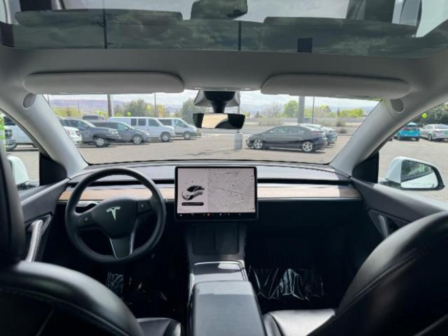 2022 Pearl White Multi-Coat /All Black Tesla Model Y Long Range (7SAYGDEE4NF) with an ELECTRIC engine, 1-Speed Automatic transmission, located at 1865 East Red Hills Pkwy, St. George, 84770, (435) 628-0023, 37.120850, -113.543640 - SOLD - But we take special orders for teslas. Call us to talk about current availability and pricing. All wheel drive long range Model Y in excellent condition. Still have 120k mile warranty on battery and motor. Gets 300+ miles on a full charge. Many of our Ev's/ Hybrids qualify for the IRS $4k - Photo#26