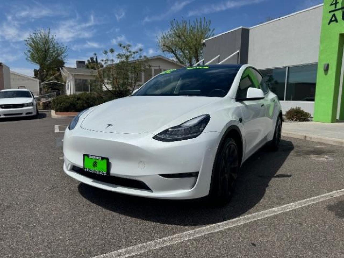 2022 Pearl White Multi-Coat /All Black Tesla Model Y Long Range (7SAYGDEE4NF) with an ELECTRIC engine, 1-Speed Automatic transmission, located at 1865 East Red Hills Pkwy, St. George, 84770, (435) 628-0023, 37.120850, -113.543640 - SOLD - But we take special orders for teslas. Call us to talk about current availability and pricing. All wheel drive long range Model Y in excellent condition. Still have 120k mile warranty on battery and motor. Gets 300+ miles on a full charge. Many of our Ev's/ Hybrids qualify for the IRS $4k - Photo#2