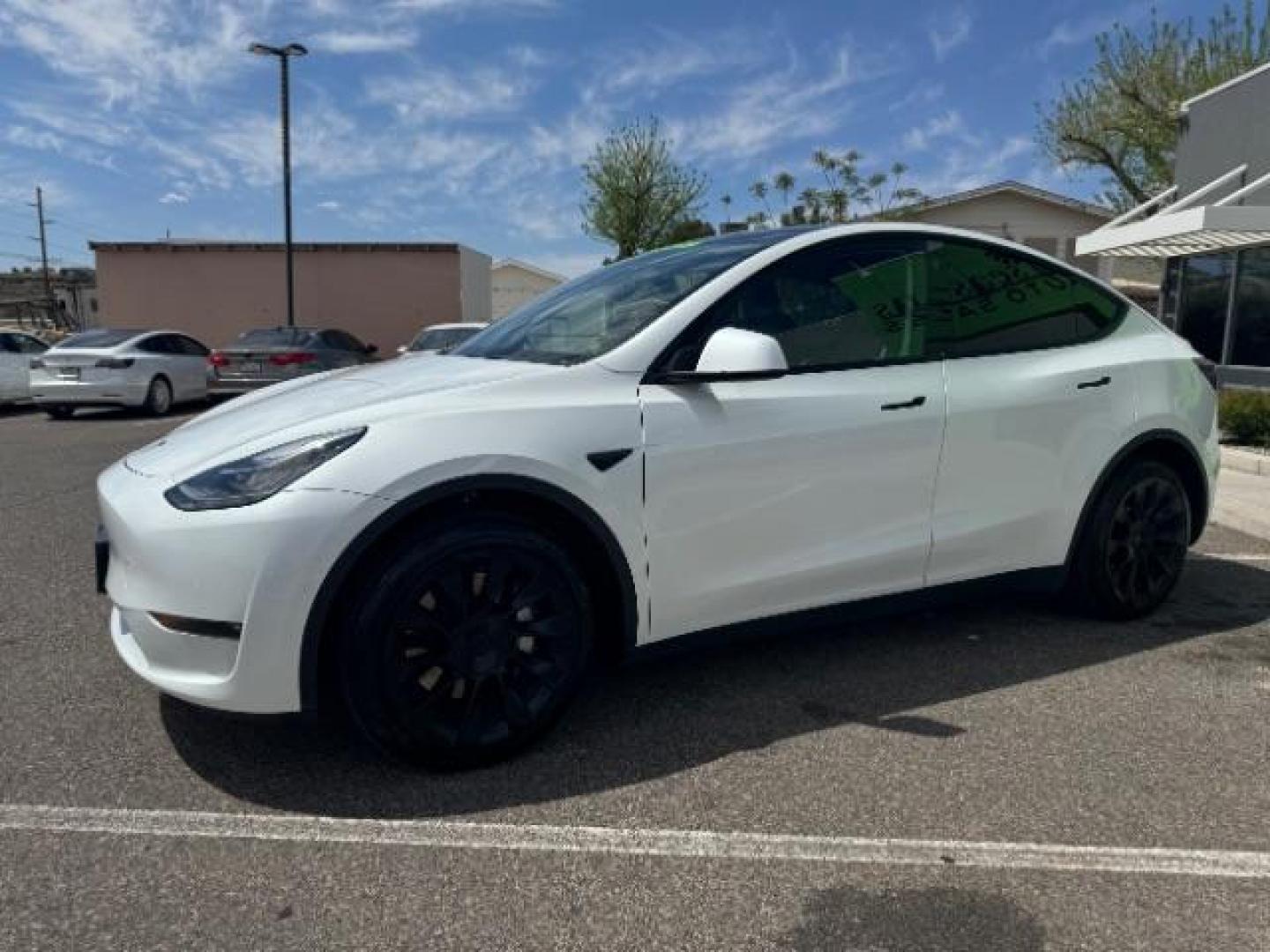 2022 Pearl White Multi-Coat /All Black Tesla Model Y Long Range (7SAYGDEE4NF) with an ELECTRIC engine, 1-Speed Automatic transmission, located at 1865 East Red Hills Pkwy, St. George, 84770, (435) 628-0023, 37.120850, -113.543640 - SOLD - But we take special orders for teslas. Call us to talk about current availability and pricing. All wheel drive long range Model Y in excellent condition. Still have 120k mile warranty on battery and motor. Gets 300+ miles on a full charge. Many of our Ev's/ Hybrids qualify for the IRS $4k - Photo#3