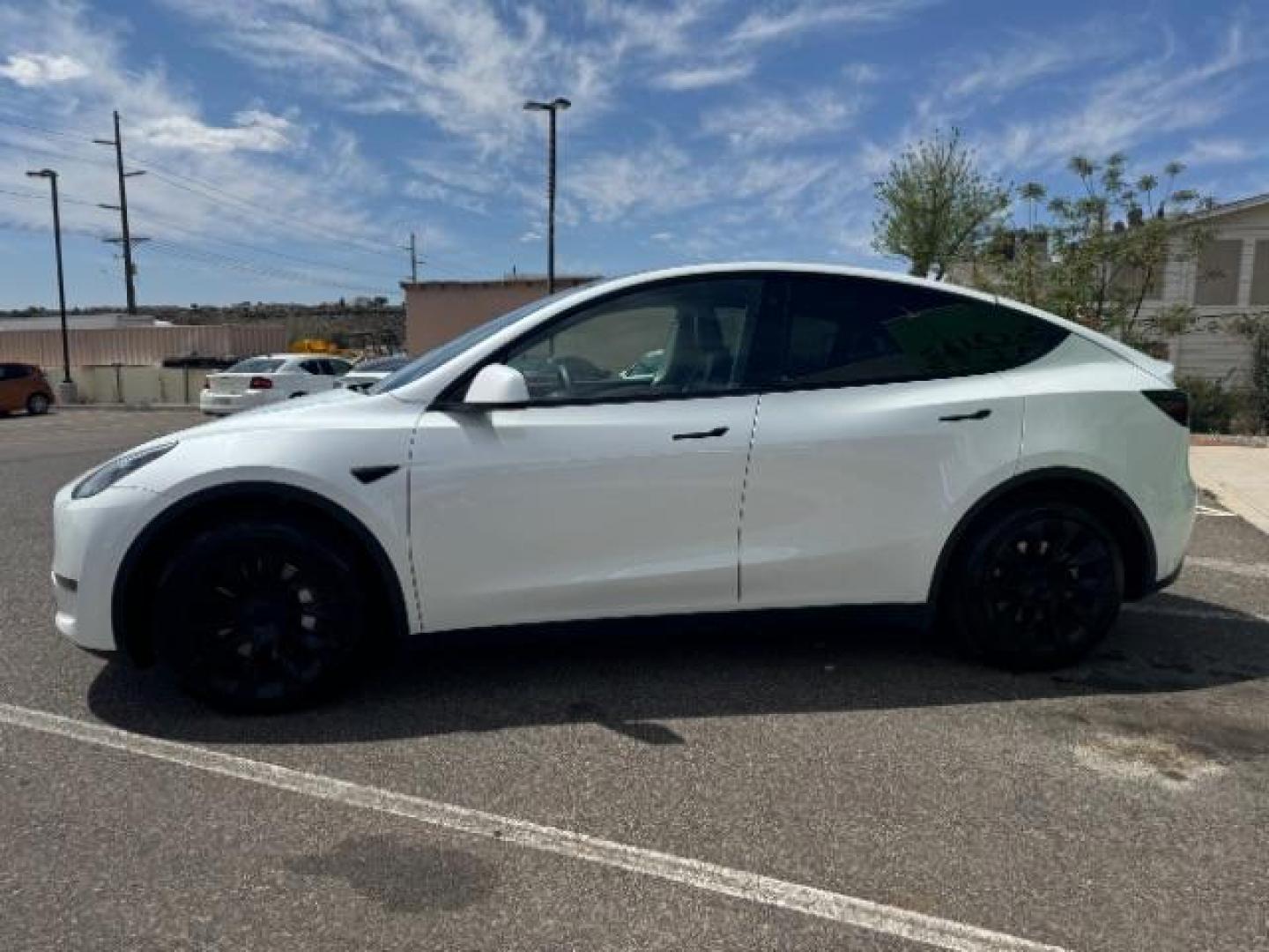 2022 Pearl White Multi-Coat /All Black Tesla Model Y Long Range (7SAYGDEE4NF) with an ELECTRIC engine, 1-Speed Automatic transmission, located at 1865 East Red Hills Pkwy, St. George, 84770, (435) 628-0023, 37.120850, -113.543640 - SOLD - But we take special orders for teslas. Call us to talk about current availability and pricing. All wheel drive long range Model Y in excellent condition. Still have 120k mile warranty on battery and motor. Gets 300+ miles on a full charge. Many of our Ev's/ Hybrids qualify for the IRS $4k - Photo#4