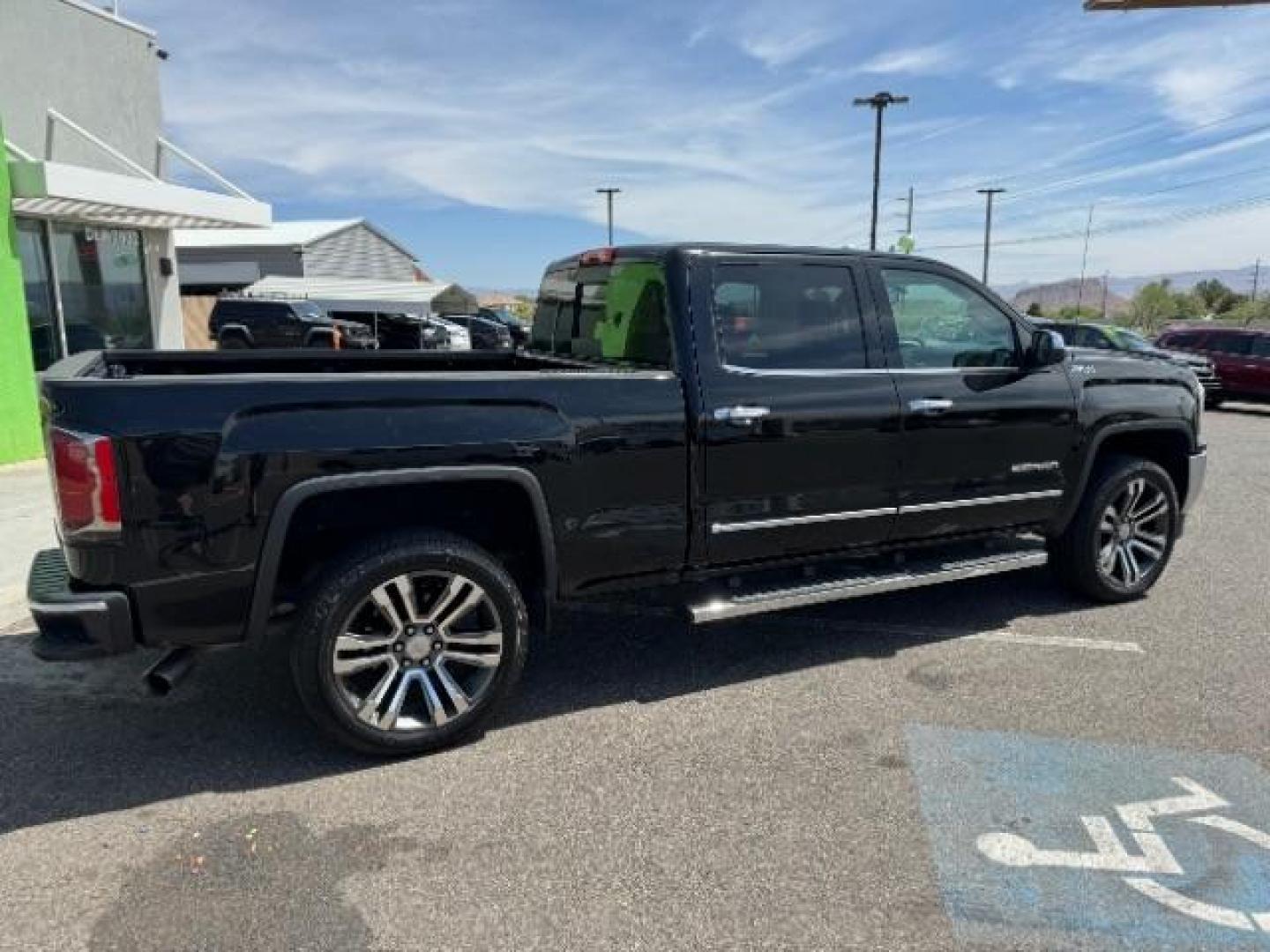 2016 Onyx Black /Jet Black, leather GMC Sierra 1500 SLT Crew Cab Long Box 4WD (3GTU2NEC5GG) with an 5.3L V8 OHV 16V engine, 6-Speed Automatic transmission, located at 1865 East Red Hills Pkwy, St. George, 84770, (435) 628-0023, 37.120850, -113.543640 - Photo#10