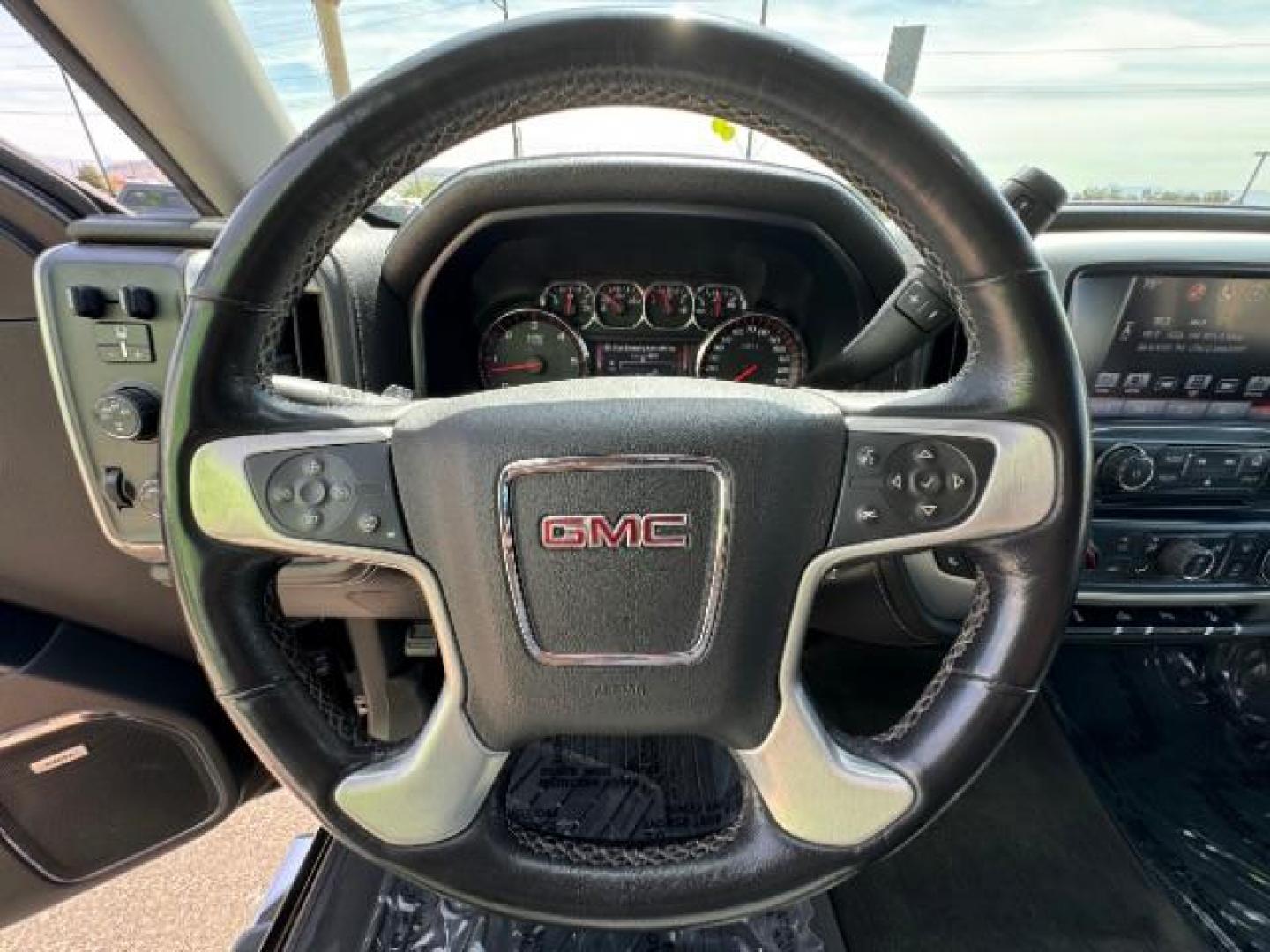 2016 Onyx Black /Jet Black, leather GMC Sierra 1500 SLT Crew Cab Long Box 4WD (3GTU2NEC5GG) with an 5.3L V8 OHV 16V engine, 6-Speed Automatic transmission, located at 1865 East Red Hills Pkwy, St. George, 84770, (435) 628-0023, 37.120850, -113.543640 - Photo#25