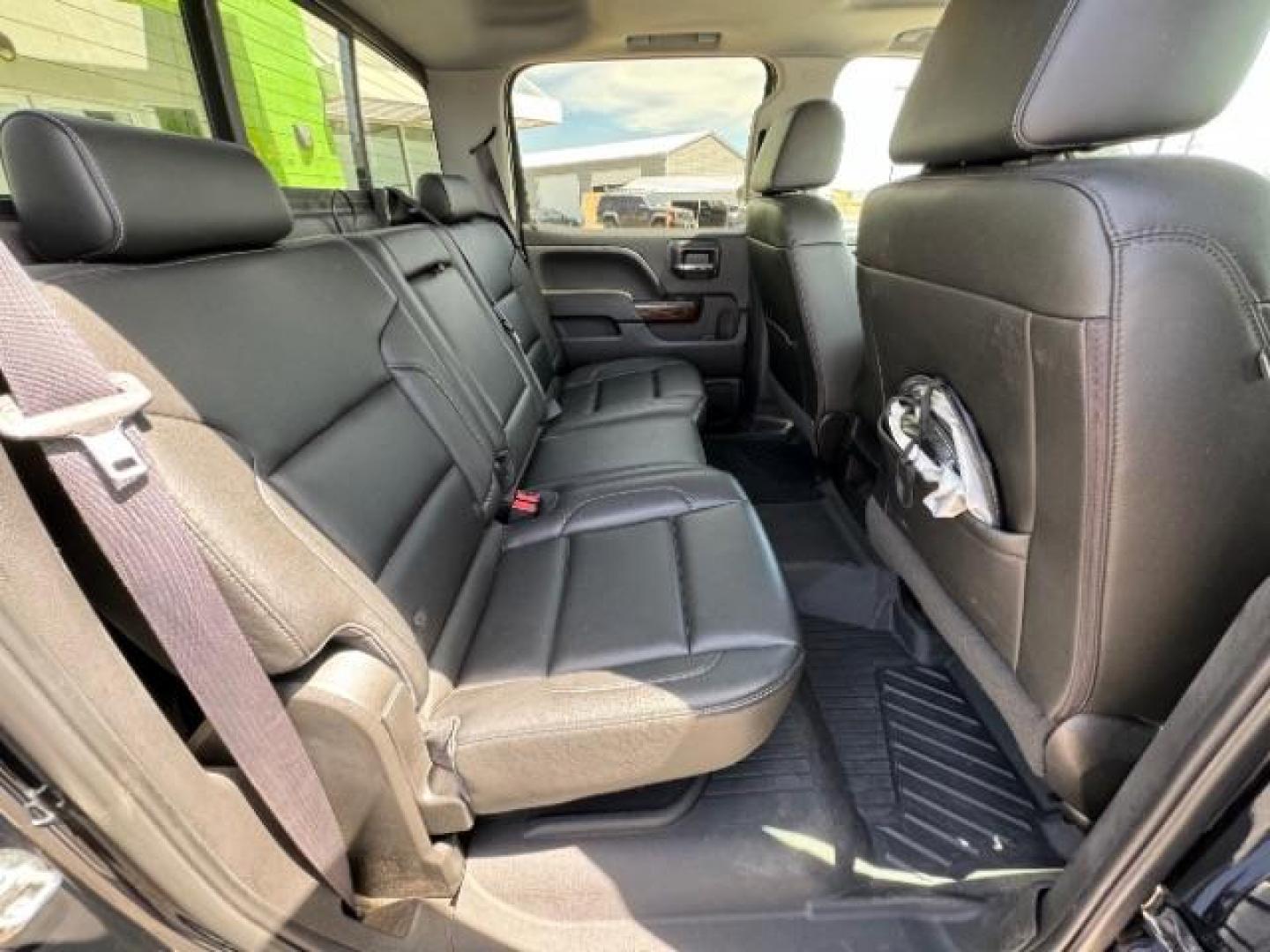 2016 Onyx Black /Jet Black, leather GMC Sierra 1500 SLT Crew Cab Long Box 4WD (3GTU2NEC5GG) with an 5.3L V8 OHV 16V engine, 6-Speed Automatic transmission, located at 1865 East Red Hills Pkwy, St. George, 84770, (435) 628-0023, 37.120850, -113.543640 - Photo#38