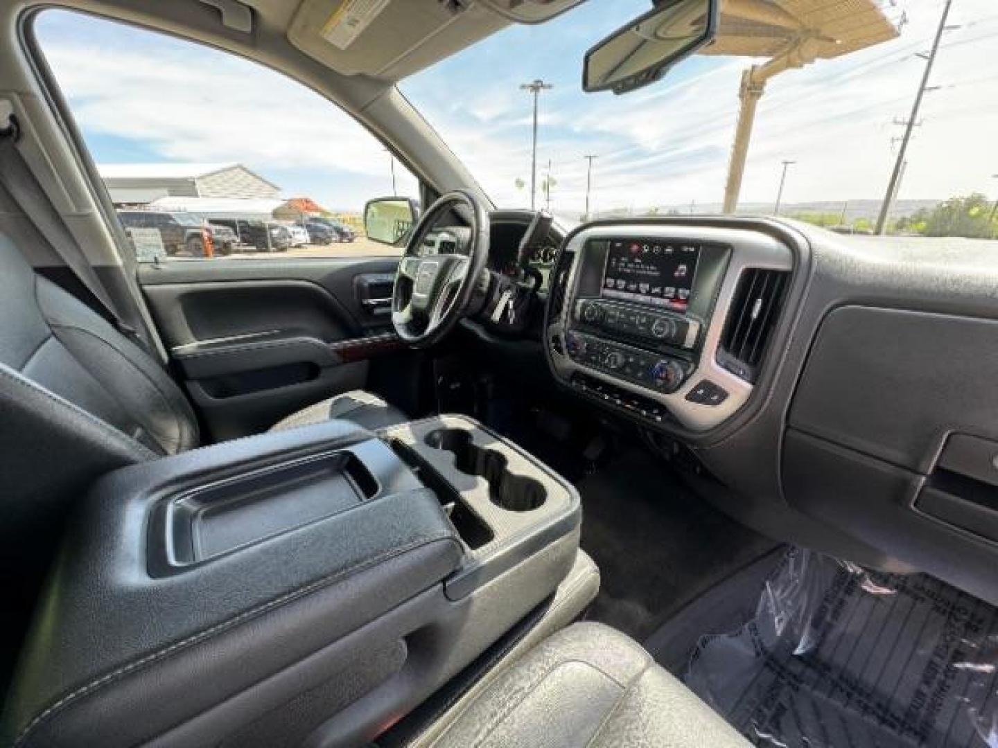 2016 Onyx Black /Jet Black, leather GMC Sierra 1500 SLT Crew Cab Long Box 4WD (3GTU2NEC5GG) with an 5.3L V8 OHV 16V engine, 6-Speed Automatic transmission, located at 1865 East Red Hills Pkwy, St. George, 84770, (435) 628-0023, 37.120850, -113.543640 - Photo#41