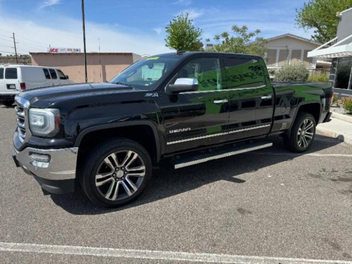 2016 Onyx Black /Jet Black, leather GMC Sierra 1500 SLT Crew Cab Long Box 4WD (3GTU2NEC5GG) with an 5.3L V8 OHV 16V engine, 6-Speed Automatic transmission, located at 1865 East Red Hills Pkwy, St. George, 84770, (435) 628-0023, 37.120850, -113.543640 - Photo#4