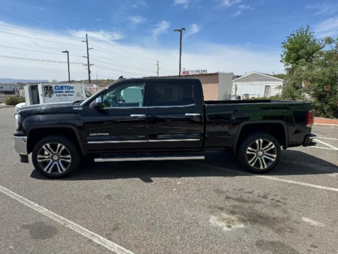 2016 Onyx Black /Jet Black, leather GMC Sierra 1500 SLT Crew Cab Long Box 4WD (3GTU2NEC5GG) with an 5.3L V8 OHV 16V engine, 6-Speed Automatic transmission, located at 1865 East Red Hills Pkwy, St. George, 84770, (435) 628-0023, 37.120850, -113.543640 - Photo#5