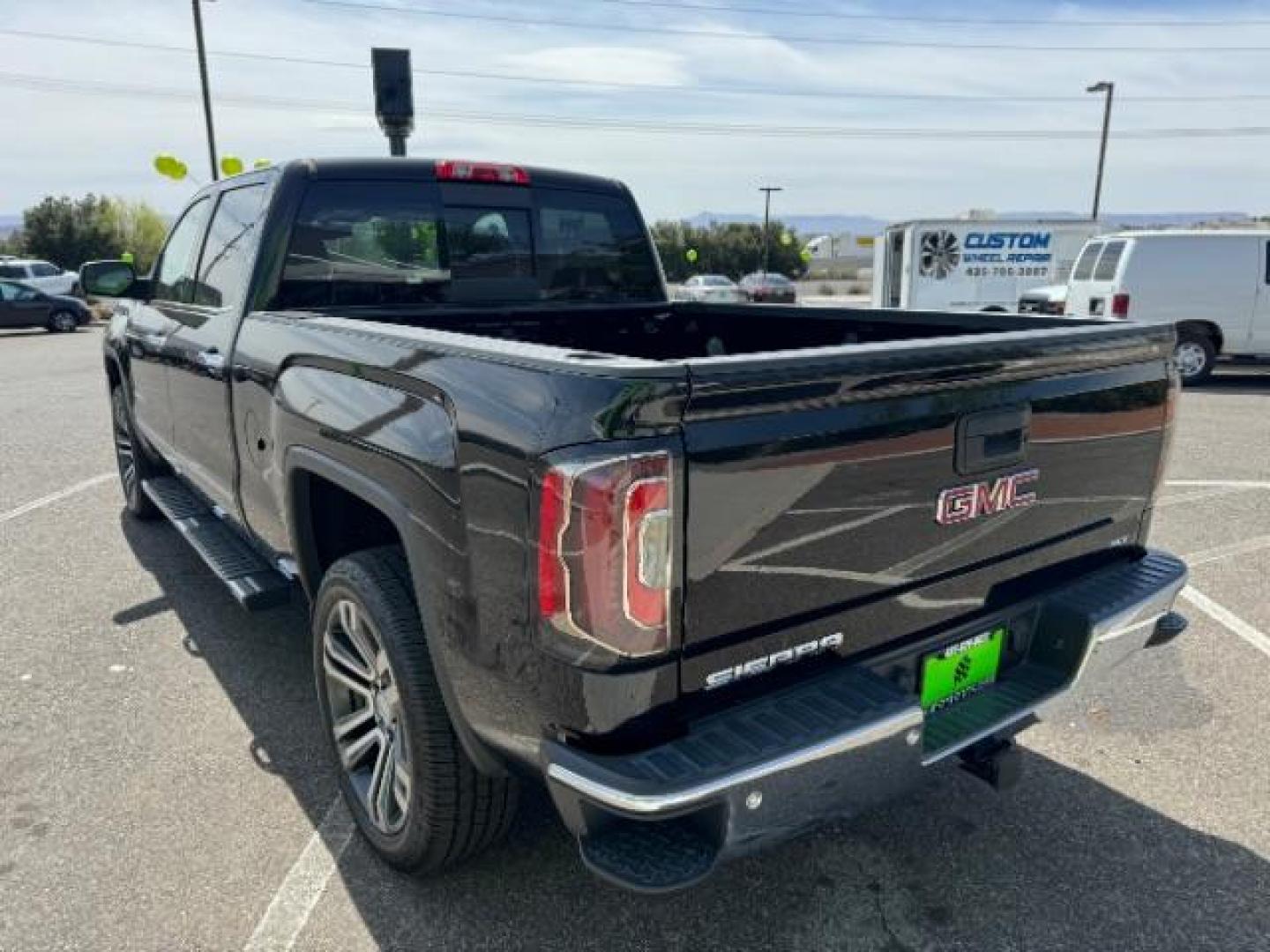 2016 Onyx Black /Jet Black, leather GMC Sierra 1500 SLT Crew Cab Long Box 4WD (3GTU2NEC5GG) with an 5.3L V8 OHV 16V engine, 6-Speed Automatic transmission, located at 1865 East Red Hills Pkwy, St. George, 84770, (435) 628-0023, 37.120850, -113.543640 - Photo#7