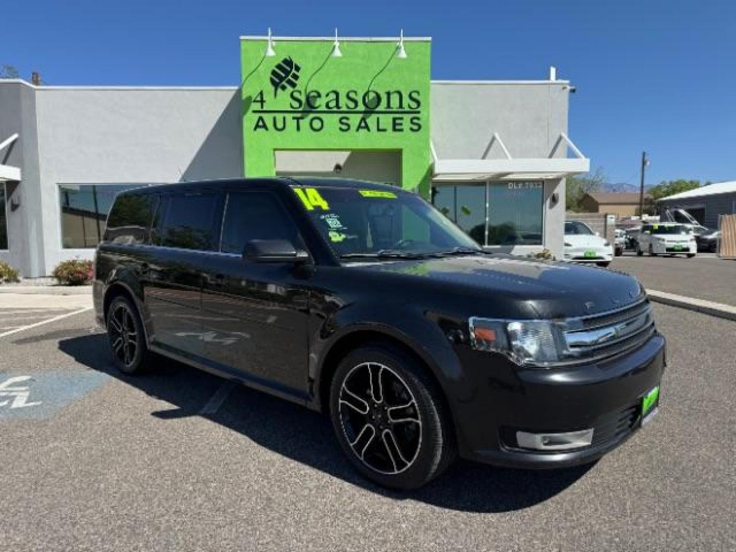 2014 Tuxedo Black Metallic /Charcoal Black Ford Flex SEL FWD (2FMGK5C88EB) with an 3.5L V6 DOHC 24V engine, 6-Speed Automatic Overdrive transmission, located at 940 North Main Street, Cedar City, UT, 84720, (435) 628-0023, 37.692936, -113.061897 - We specialize in helping ALL people get the best financing available. No matter your credit score, good, bad or none we can get you an amazing rate. Had a bankruptcy, divorce, or repossessions? We give you the green light to get your credit back on the road. Low down and affordable payments that fit - Photo#0