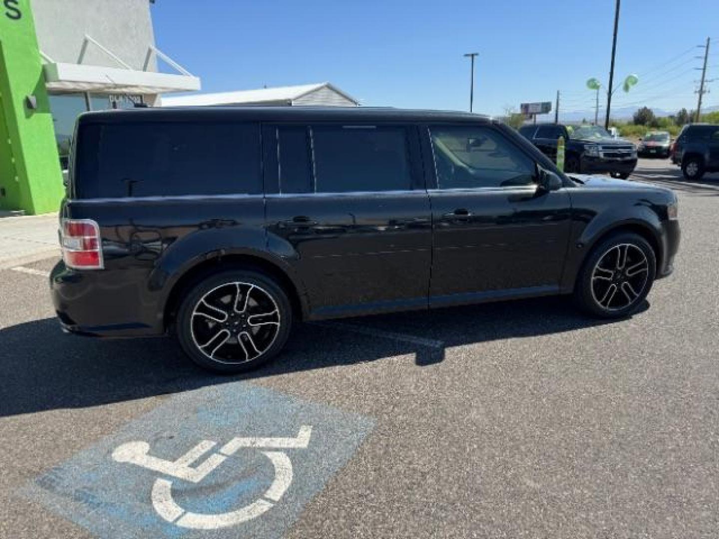 2014 Tuxedo Black Metallic /Charcoal Black Ford Flex SEL FWD (2FMGK5C88EB) with an 3.5L V6 DOHC 24V engine, 6-Speed Automatic Overdrive transmission, located at 940 North Main Street, Cedar City, UT, 84720, (435) 628-0023, 37.692936, -113.061897 - We specialize in helping ALL people get the best financing available. No matter your credit score, good, bad or none we can get you an amazing rate. Had a bankruptcy, divorce, or repossessions? We give you the green light to get your credit back on the road. Low down and affordable payments that fit - Photo#12