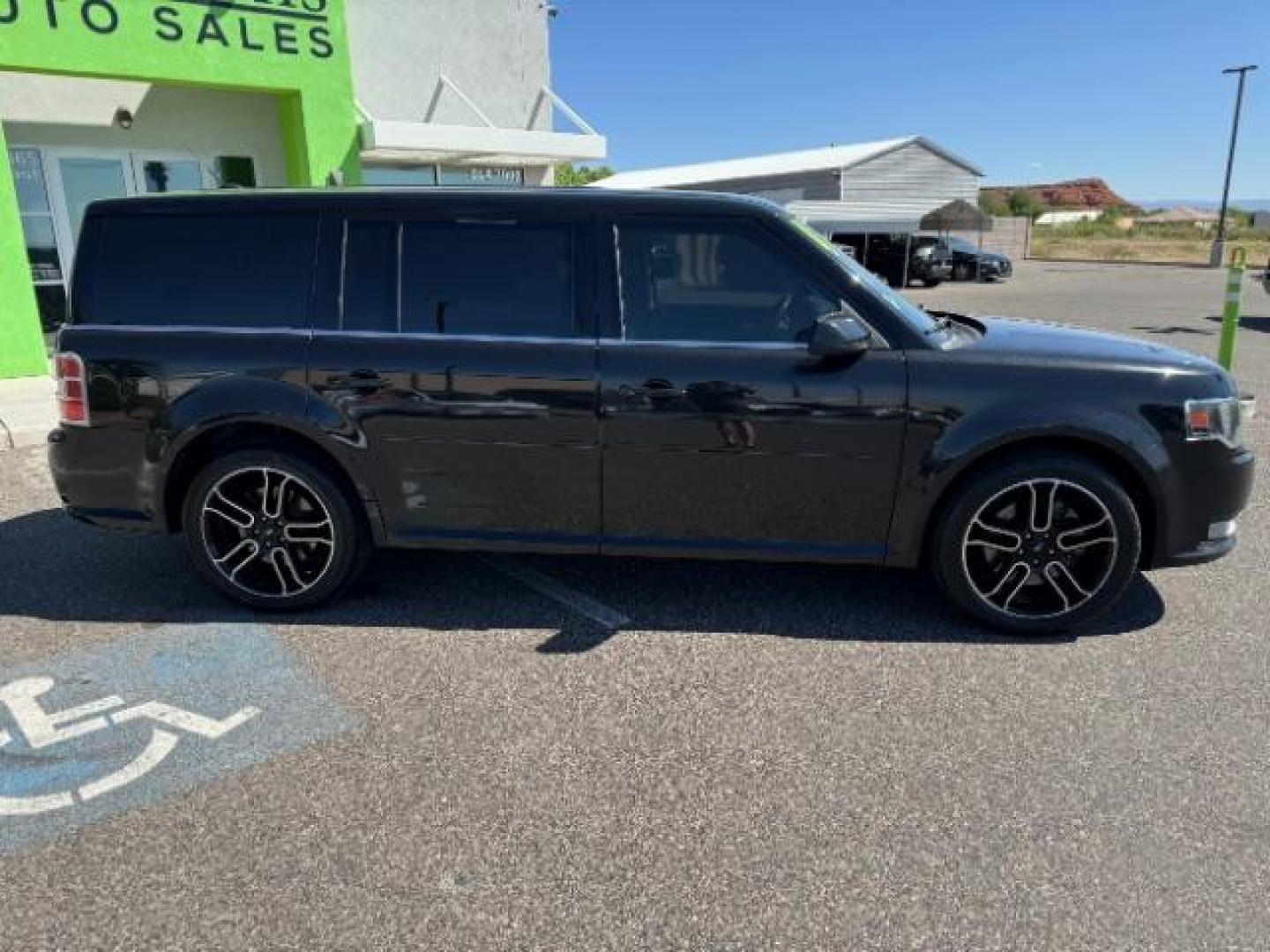 2014 Tuxedo Black Metallic /Charcoal Black Ford Flex SEL FWD (2FMGK5C88EB) with an 3.5L V6 DOHC 24V engine, 6-Speed Automatic Overdrive transmission, located at 940 North Main Street, Cedar City, UT, 84720, (435) 628-0023, 37.692936, -113.061897 - We specialize in helping ALL people get the best financing available. No matter your credit score, good, bad or none we can get you an amazing rate. Had a bankruptcy, divorce, or repossessions? We give you the green light to get your credit back on the road. Low down and affordable payments that fit - Photo#13