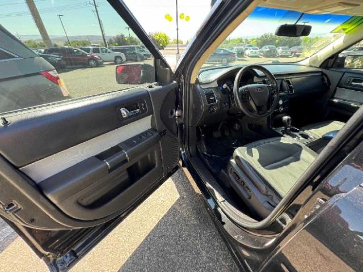 2014 Tuxedo Black Metallic /Charcoal Black Ford Flex SEL FWD (2FMGK5C88EB) with an 3.5L V6 DOHC 24V engine, 6-Speed Automatic Overdrive transmission, located at 940 North Main Street, Cedar City, UT, 84720, (435) 628-0023, 37.692936, -113.061897 - We specialize in helping ALL people get the best financing available. No matter your credit score, good, bad or none we can get you an amazing rate. Had a bankruptcy, divorce, or repossessions? We give you the green light to get your credit back on the road. Low down and affordable payments that fit - Photo#18