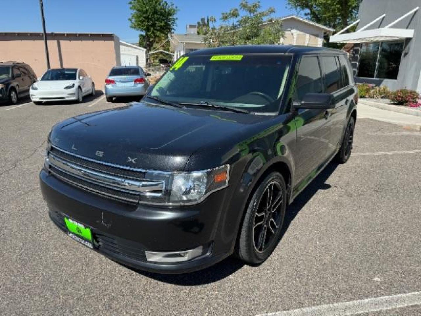 2014 Tuxedo Black Metallic /Charcoal Black Ford Flex SEL FWD (2FMGK5C88EB) with an 3.5L V6 DOHC 24V engine, 6-Speed Automatic Overdrive transmission, located at 940 North Main Street, Cedar City, UT, 84720, (435) 628-0023, 37.692936, -113.061897 - We specialize in helping ALL people get the best financing available. No matter your credit score, good, bad or none we can get you an amazing rate. Had a bankruptcy, divorce, or repossessions? We give you the green light to get your credit back on the road. Low down and affordable payments that fit - Photo#3