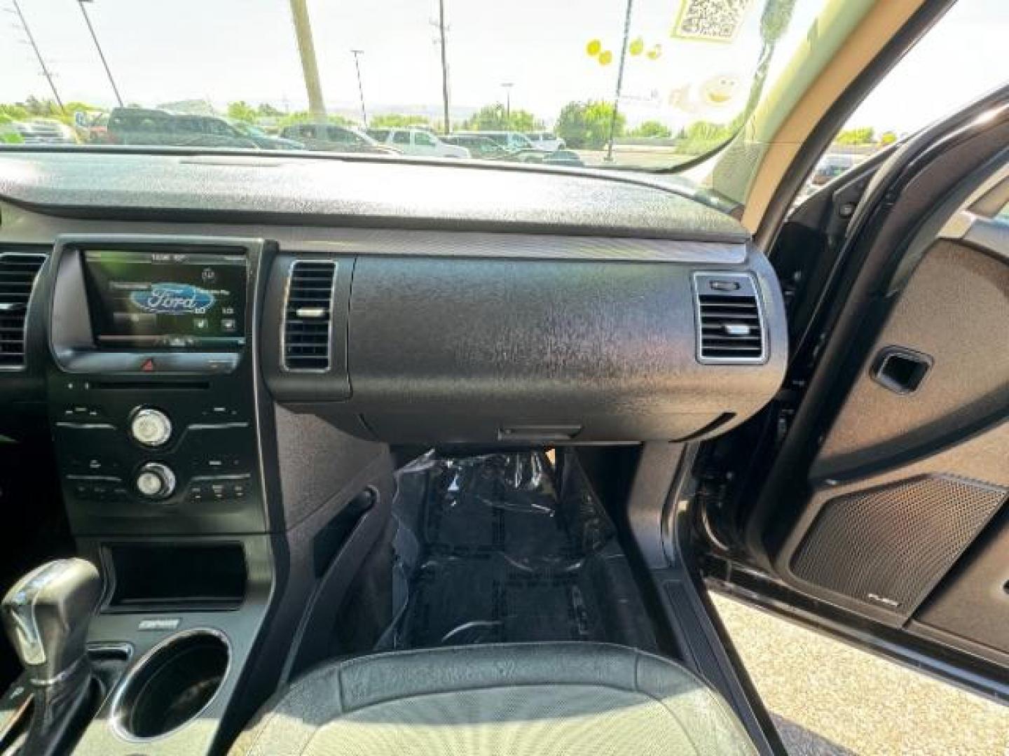 2014 Tuxedo Black Metallic /Charcoal Black Ford Flex SEL FWD (2FMGK5C88EB) with an 3.5L V6 DOHC 24V engine, 6-Speed Automatic Overdrive transmission, located at 940 North Main Street, Cedar City, UT, 84720, (435) 628-0023, 37.692936, -113.061897 - We specialize in helping ALL people get the best financing available. No matter your credit score, good, bad or none we can get you an amazing rate. Had a bankruptcy, divorce, or repossessions? We give you the green light to get your credit back on the road. Low down and affordable payments that fit - Photo#39