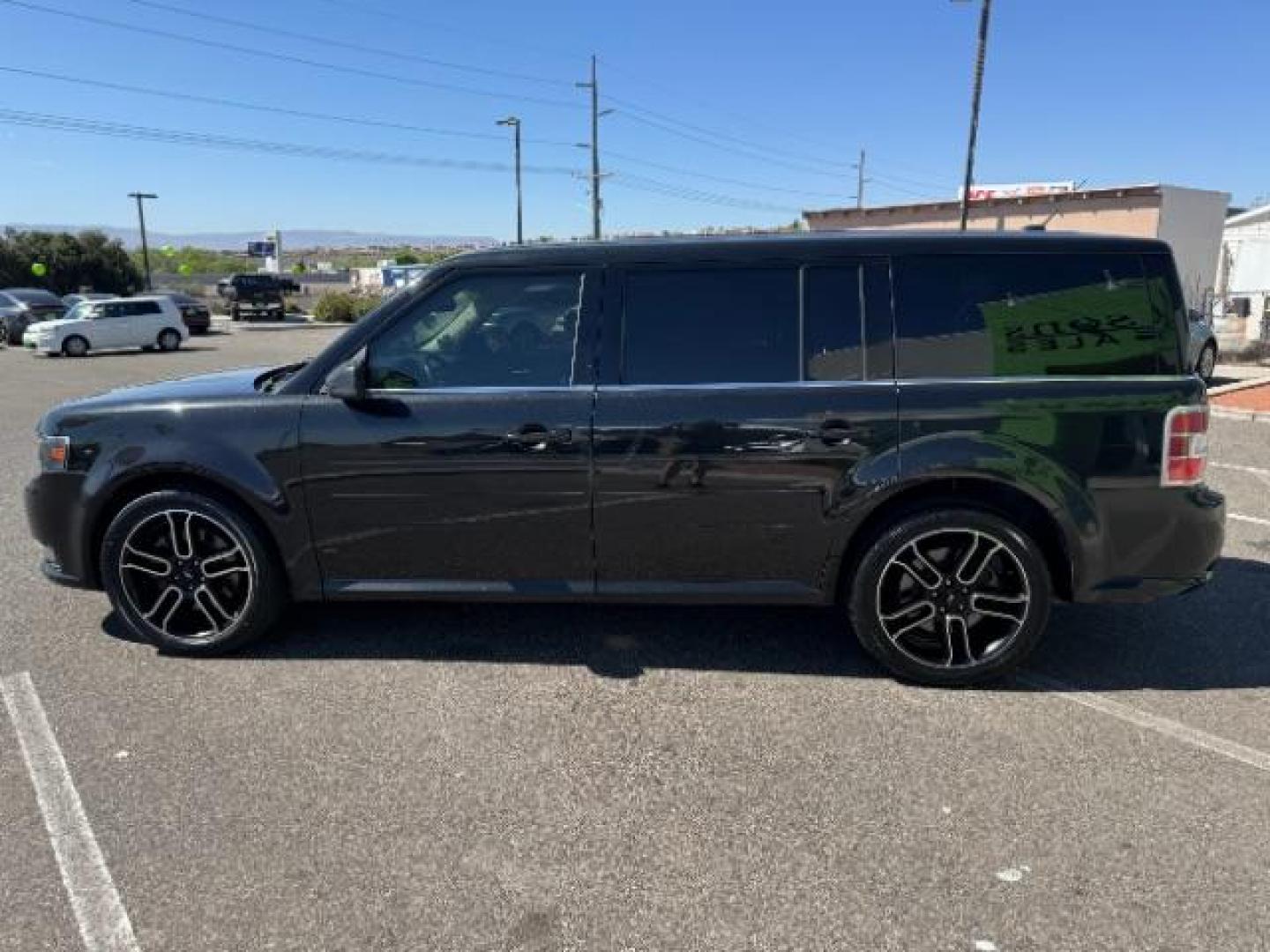 2014 Tuxedo Black Metallic /Charcoal Black Ford Flex SEL FWD (2FMGK5C88EB) with an 3.5L V6 DOHC 24V engine, 6-Speed Automatic Overdrive transmission, located at 940 North Main Street, Cedar City, UT, 84720, (435) 628-0023, 37.692936, -113.061897 - We specialize in helping ALL people get the best financing available. No matter your credit score, good, bad or none we can get you an amazing rate. Had a bankruptcy, divorce, or repossessions? We give you the green light to get your credit back on the road. Low down and affordable payments that fit - Photo#5