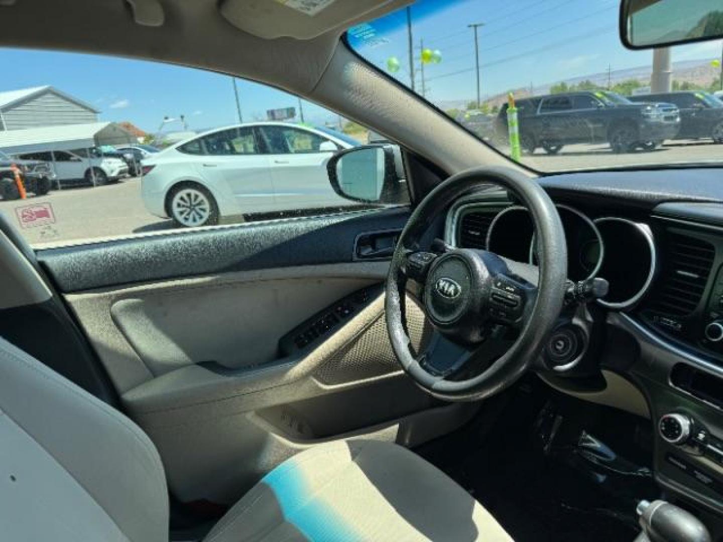 2015 Satin Metal /Beige Kia Optima LX (5XXGM4A71FG) with an 2.4L L4 DOHC 16V engine, 6-Speed Automatic transmission, located at 1865 East Red Hills Pkwy, St. George, 84770, (435) 628-0023, 37.120850, -113.543640 - We specialize in helping ALL people get the best financing available. No matter your credit score, good, bad or none we can get you an amazing rate. Had a bankruptcy, divorce, or repossessions? We give you the green light to get your credit back on the road. Low down and affordable payments that fit - Photo#31