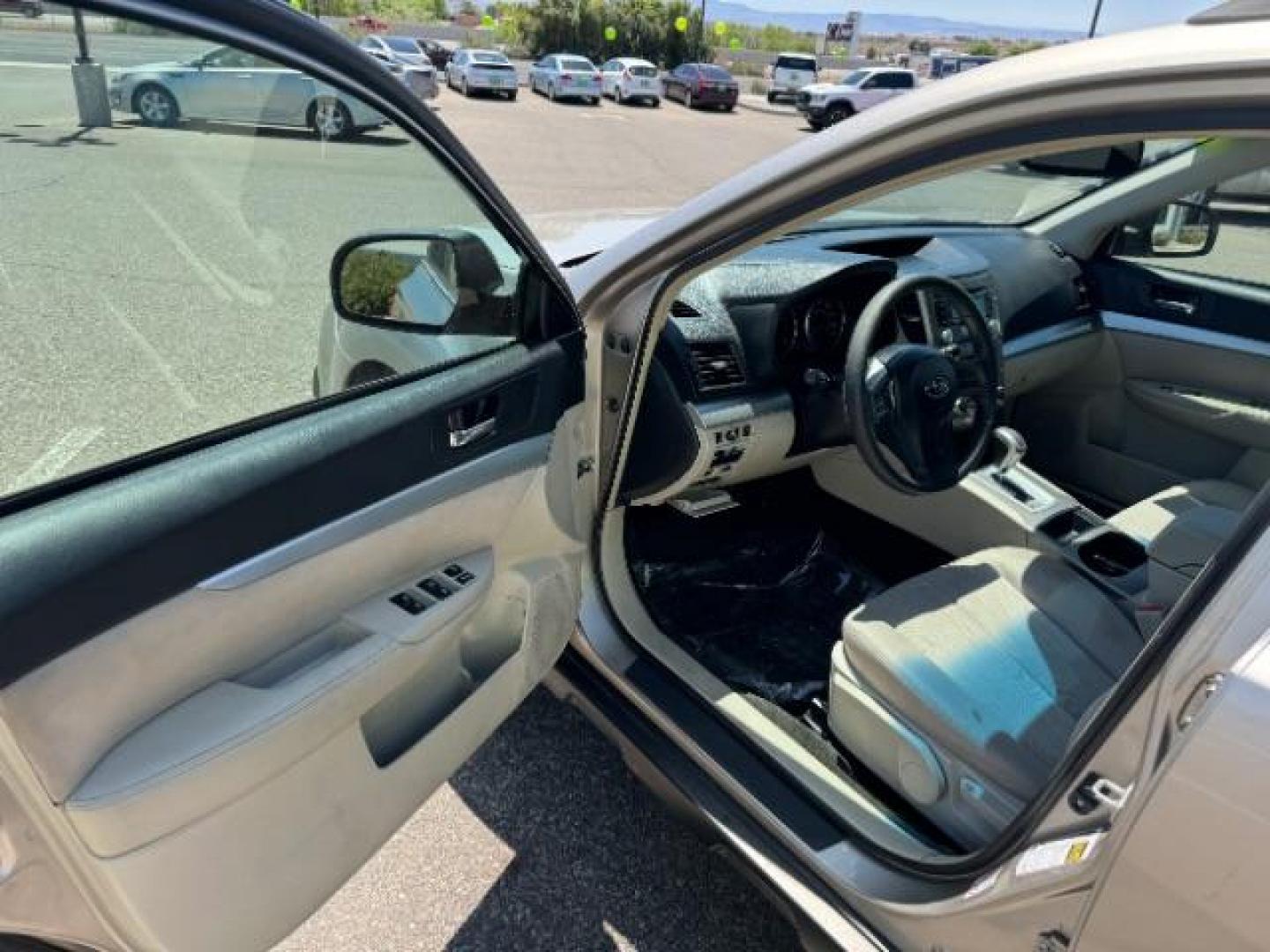 2014 Gold /Ivory Subaru Outback 2.5i (4S4BRBAC9E3) with an 2.5L H4 DOHC 16V engine, Continuously Variable Transmission transmission, located at 940 North Main Street, Cedar City, UT, 84720, (435) 628-0023, 37.692936, -113.061897 - We specialize in helping ALL people get the best financing available. No matter your credit score, good, bad or none we can get you an amazing rate. Had a bankruptcy, divorce, or repossessions? We give you the green light to get your credit back on the road. Low down and affordable payments that fit - Photo#12