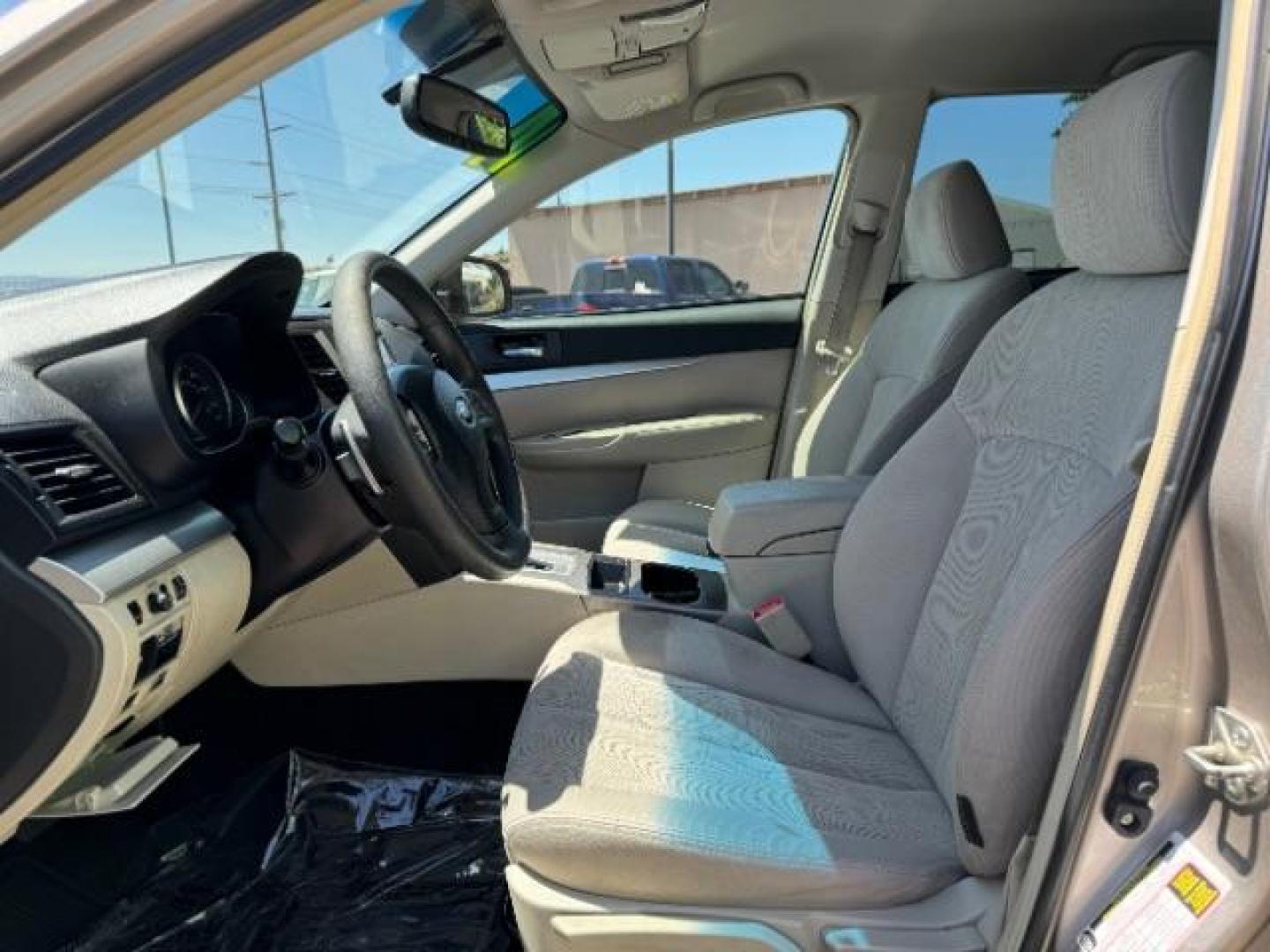 2014 Gold /Ivory Subaru Outback 2.5i (4S4BRBAC9E3) with an 2.5L H4 DOHC 16V engine, Continuously Variable Transmission transmission, located at 940 North Main Street, Cedar City, UT, 84720, (435) 628-0023, 37.692936, -113.061897 - We specialize in helping ALL people get the best financing available. No matter your credit score, good, bad or none we can get you an amazing rate. Had a bankruptcy, divorce, or repossessions? We give you the green light to get your credit back on the road. Low down and affordable payments that fit - Photo#15