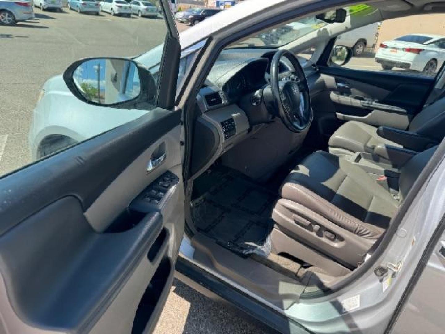 2014 Alabaster Silver Metallic /Beige Honda Odyssey EX-L (5FNRL5H62EB) with an 3.5L V6 SOHC 24V engine, 6-Speed Automatic transmission, located at 940 North Main Street, Cedar City, UT, 84720, (435) 628-0023, 37.692936, -113.061897 - We specialize in helping ALL people get the best financing available. No matter your credit score, good, bad or none we can get you an amazing rate. Had a bankruptcy, divorce, or repossessions? We give you the green light to get your credit back on the road. Low down and affordable payments that fit - Photo#12