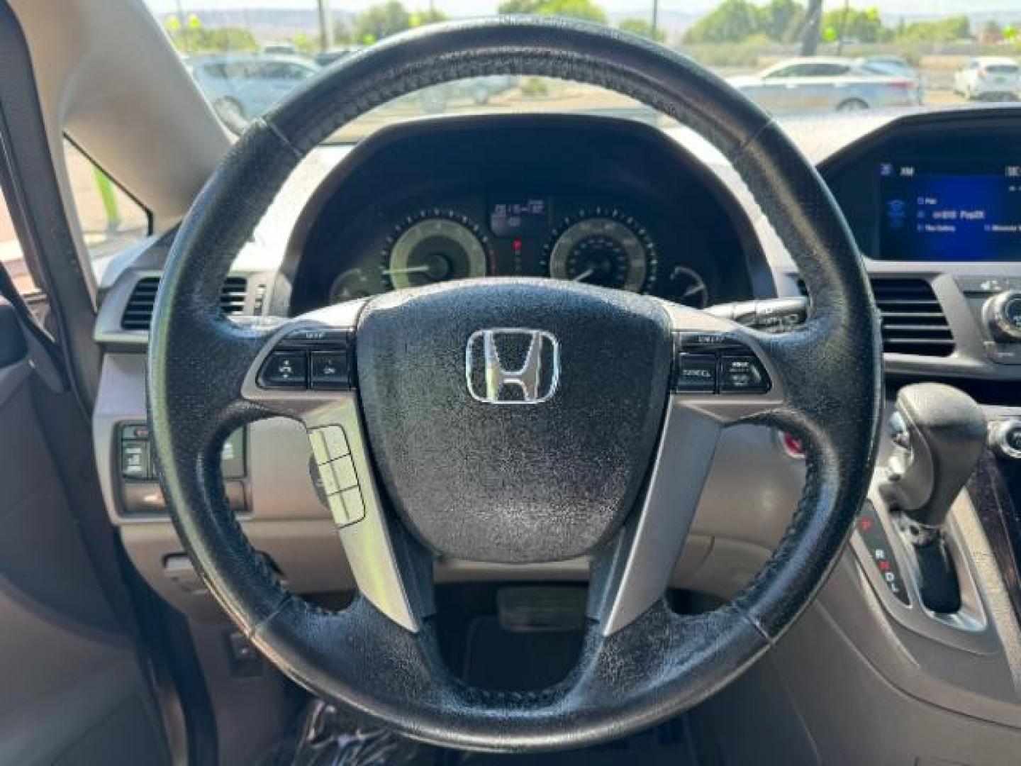 2014 Alabaster Silver Metallic /Beige Honda Odyssey EX-L (5FNRL5H62EB) with an 3.5L V6 SOHC 24V engine, 6-Speed Automatic transmission, located at 940 North Main Street, Cedar City, UT, 84720, (435) 628-0023, 37.692936, -113.061897 - We specialize in helping ALL people get the best financing available. No matter your credit score, good, bad or none we can get you an amazing rate. Had a bankruptcy, divorce, or repossessions? We give you the green light to get your credit back on the road. Low down and affordable payments that fit - Photo#17