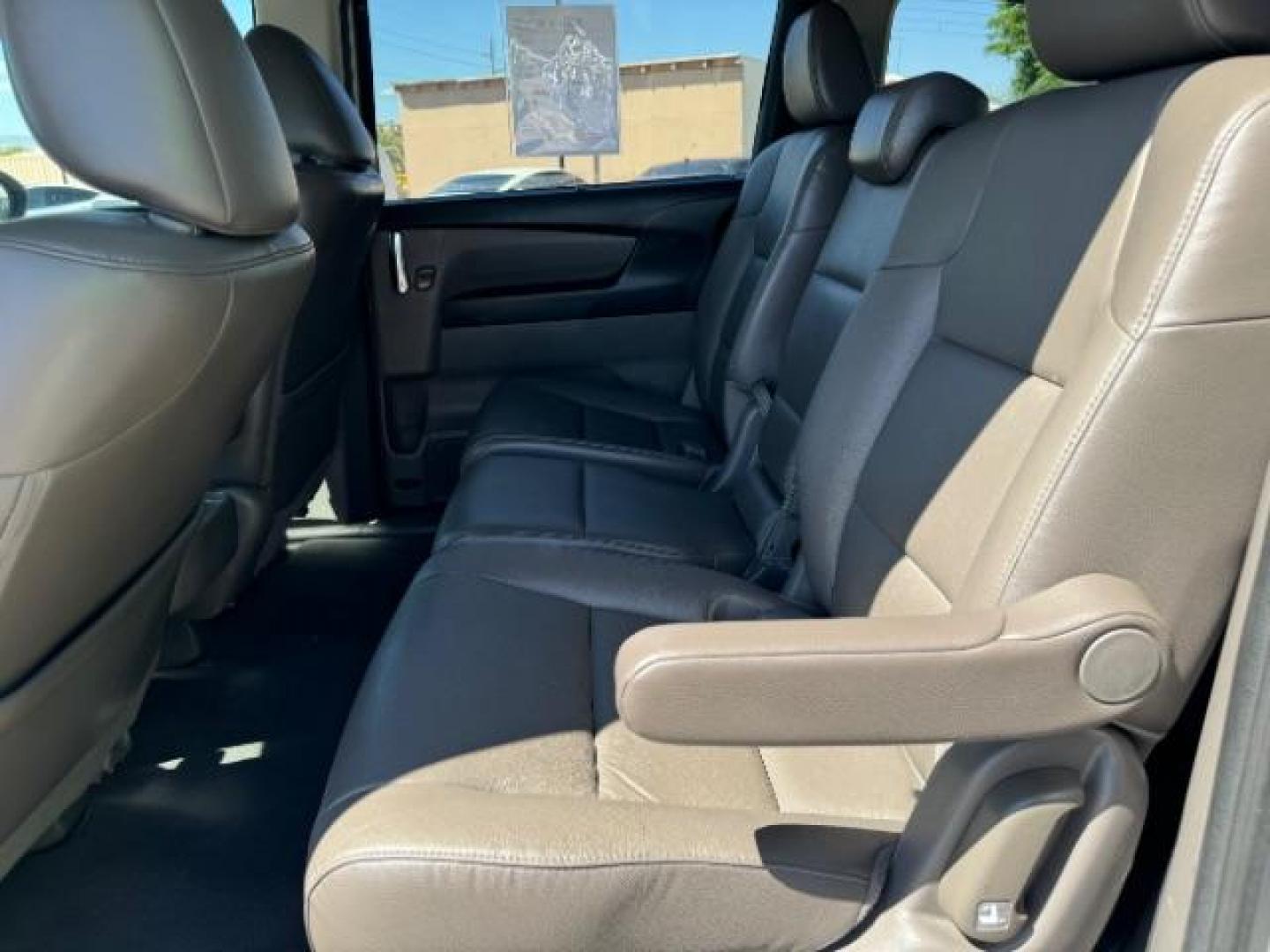 2014 Alabaster Silver Metallic /Beige Honda Odyssey EX-L (5FNRL5H62EB) with an 3.5L V6 SOHC 24V engine, 6-Speed Automatic transmission, located at 940 North Main Street, Cedar City, UT, 84720, (435) 628-0023, 37.692936, -113.061897 - We specialize in helping ALL people get the best financing available. No matter your credit score, good, bad or none we can get you an amazing rate. Had a bankruptcy, divorce, or repossessions? We give you the green light to get your credit back on the road. Low down and affordable payments that fit - Photo#23