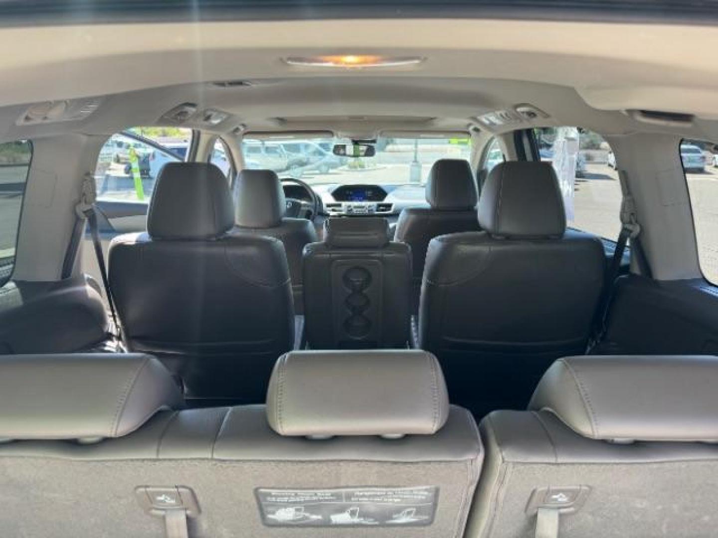 2014 Alabaster Silver Metallic /Beige Honda Odyssey EX-L (5FNRL5H62EB) with an 3.5L V6 SOHC 24V engine, 6-Speed Automatic transmission, located at 940 North Main Street, Cedar City, UT, 84720, (435) 628-0023, 37.692936, -113.061897 - We specialize in helping ALL people get the best financing available. No matter your credit score, good, bad or none we can get you an amazing rate. Had a bankruptcy, divorce, or repossessions? We give you the green light to get your credit back on the road. Low down and affordable payments that fit - Photo#25