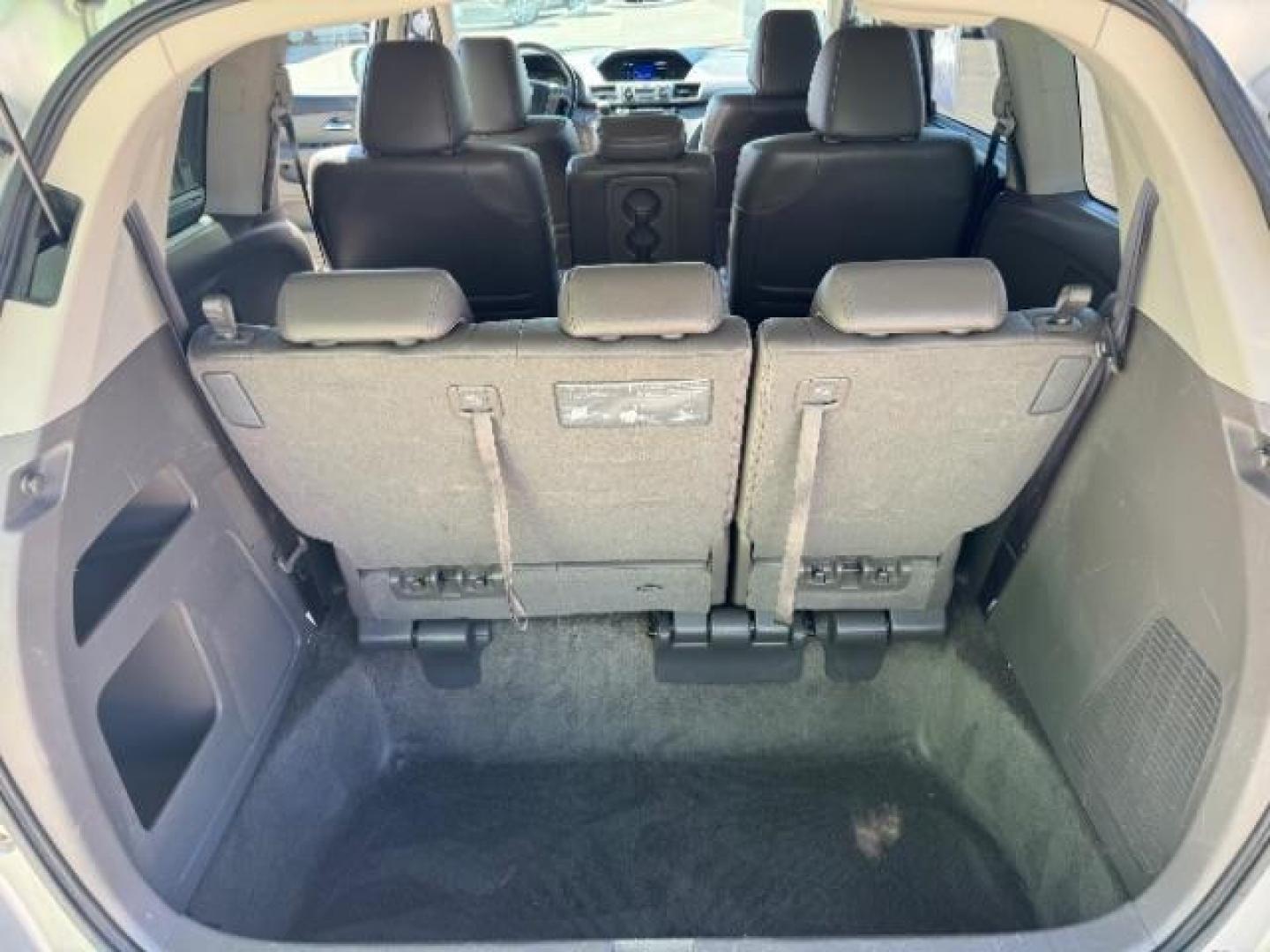 2014 Alabaster Silver Metallic /Beige Honda Odyssey EX-L (5FNRL5H62EB) with an 3.5L V6 SOHC 24V engine, 6-Speed Automatic transmission, located at 940 North Main Street, Cedar City, UT, 84720, (435) 628-0023, 37.692936, -113.061897 - We specialize in helping ALL people get the best financing available. No matter your credit score, good, bad or none we can get you an amazing rate. Had a bankruptcy, divorce, or repossessions? We give you the green light to get your credit back on the road. Low down and affordable payments that fit - Photo#26