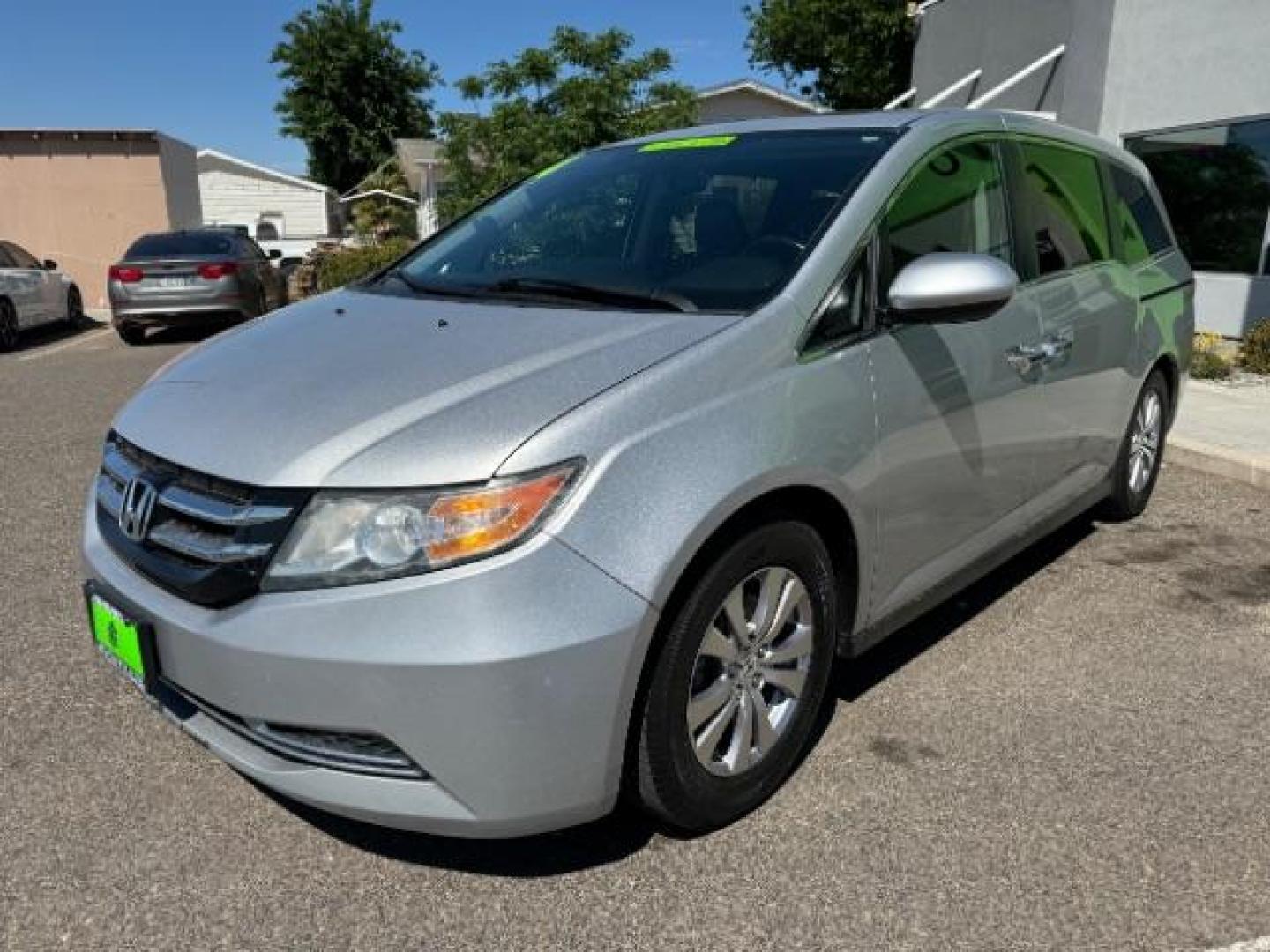 2014 Alabaster Silver Metallic /Beige Honda Odyssey EX-L (5FNRL5H62EB) with an 3.5L V6 SOHC 24V engine, 6-Speed Automatic transmission, located at 940 North Main Street, Cedar City, UT, 84720, (435) 628-0023, 37.692936, -113.061897 - We specialize in helping ALL people get the best financing available. No matter your credit score, good, bad or none we can get you an amazing rate. Had a bankruptcy, divorce, or repossessions? We give you the green light to get your credit back on the road. Low down and affordable payments that fit - Photo#2