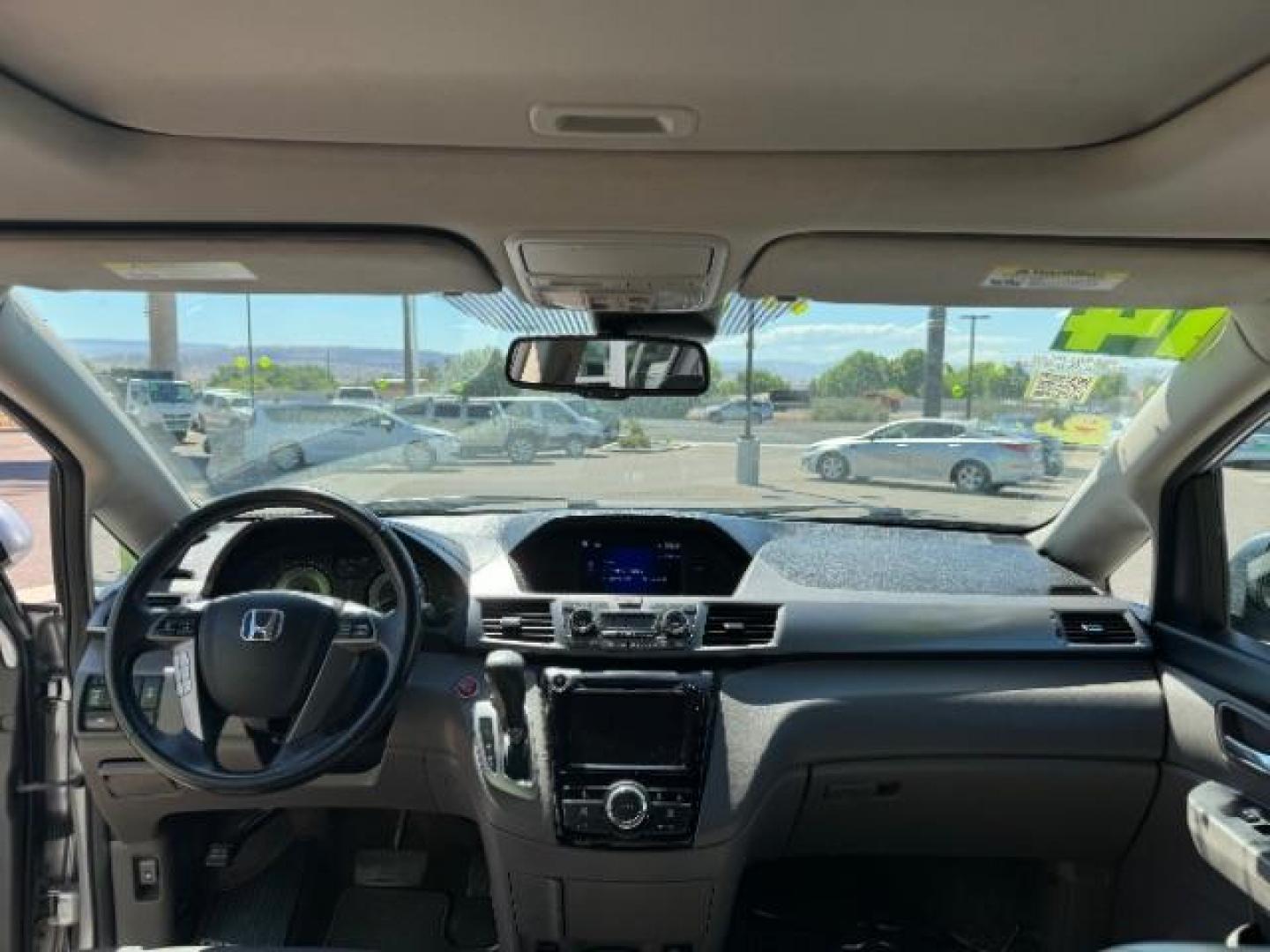 2014 Alabaster Silver Metallic /Beige Honda Odyssey EX-L (5FNRL5H62EB) with an 3.5L V6 SOHC 24V engine, 6-Speed Automatic transmission, located at 940 North Main Street, Cedar City, UT, 84720, (435) 628-0023, 37.692936, -113.061897 - We specialize in helping ALL people get the best financing available. No matter your credit score, good, bad or none we can get you an amazing rate. Had a bankruptcy, divorce, or repossessions? We give you the green light to get your credit back on the road. Low down and affordable payments that fit - Photo#31