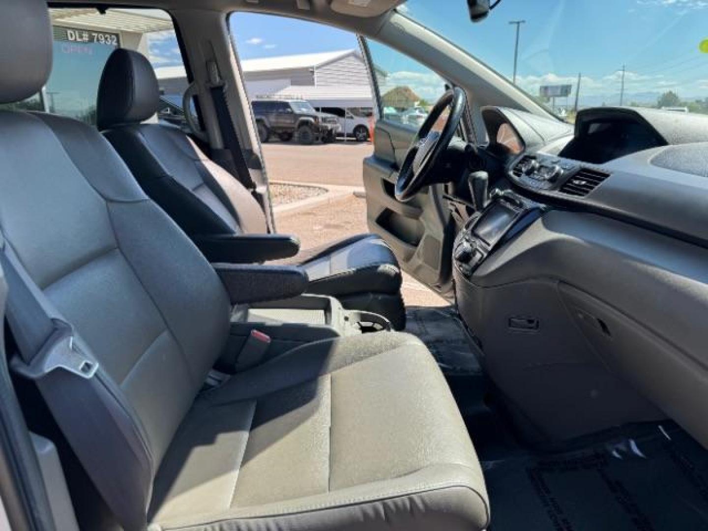 2014 Alabaster Silver Metallic /Beige Honda Odyssey EX-L (5FNRL5H62EB) with an 3.5L V6 SOHC 24V engine, 6-Speed Automatic transmission, located at 940 North Main Street, Cedar City, UT, 84720, (435) 628-0023, 37.692936, -113.061897 - We specialize in helping ALL people get the best financing available. No matter your credit score, good, bad or none we can get you an amazing rate. Had a bankruptcy, divorce, or repossessions? We give you the green light to get your credit back on the road. Low down and affordable payments that fit - Photo#34