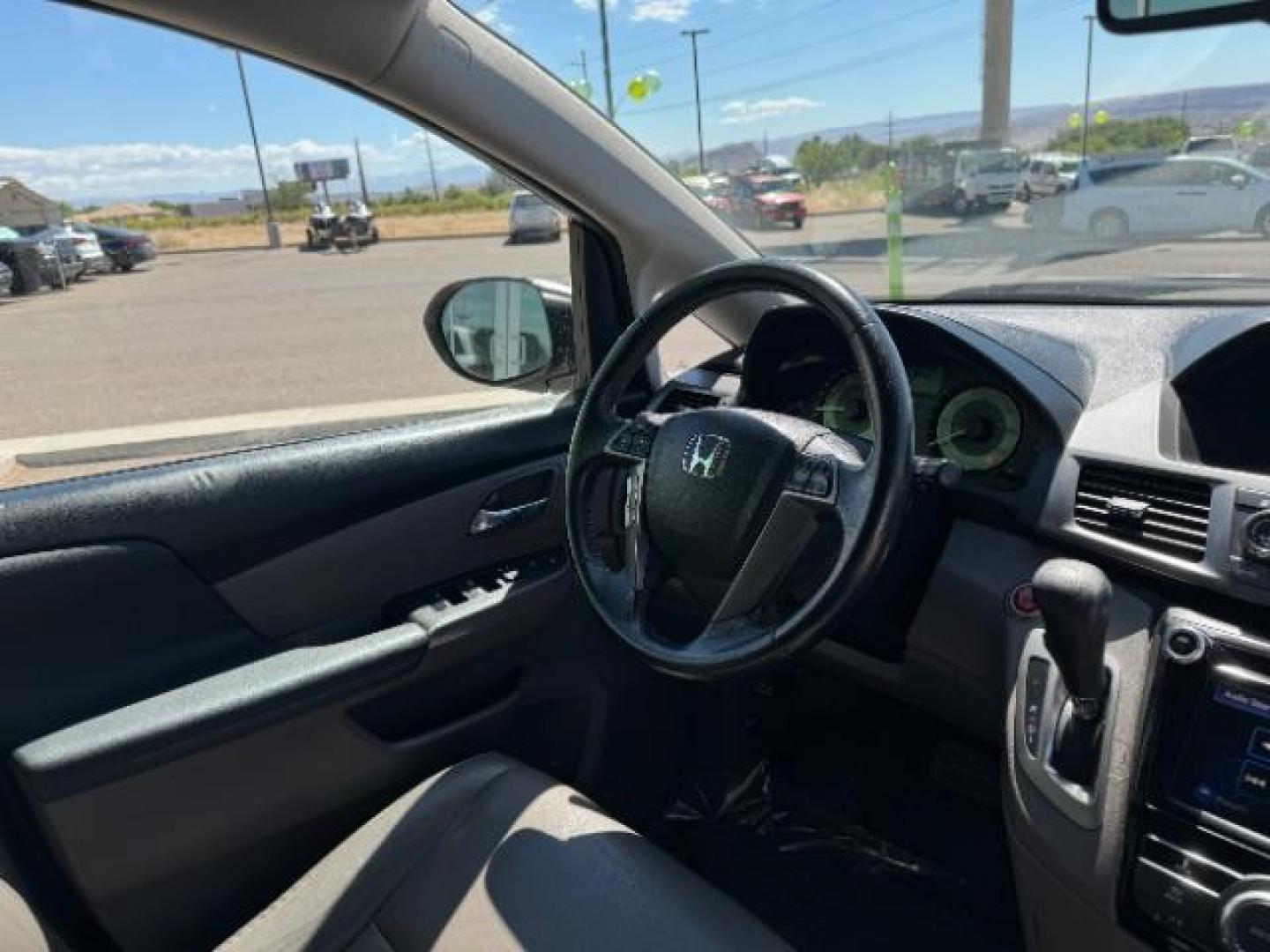 2014 Alabaster Silver Metallic /Beige Honda Odyssey EX-L (5FNRL5H62EB) with an 3.5L V6 SOHC 24V engine, 6-Speed Automatic transmission, located at 940 North Main Street, Cedar City, UT, 84720, (435) 628-0023, 37.692936, -113.061897 - We specialize in helping ALL people get the best financing available. No matter your credit score, good, bad or none we can get you an amazing rate. Had a bankruptcy, divorce, or repossessions? We give you the green light to get your credit back on the road. Low down and affordable payments that fit - Photo#36