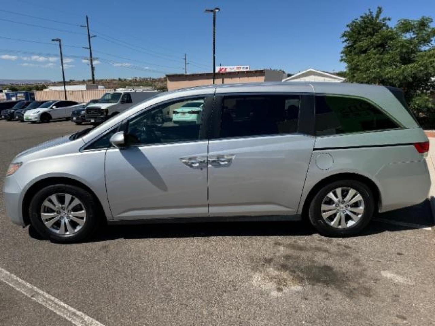 2014 Alabaster Silver Metallic /Beige Honda Odyssey EX-L (5FNRL5H62EB) with an 3.5L V6 SOHC 24V engine, 6-Speed Automatic transmission, located at 940 North Main Street, Cedar City, UT, 84720, (435) 628-0023, 37.692936, -113.061897 - We specialize in helping ALL people get the best financing available. No matter your credit score, good, bad or none we can get you an amazing rate. Had a bankruptcy, divorce, or repossessions? We give you the green light to get your credit back on the road. Low down and affordable payments that fit - Photo#3