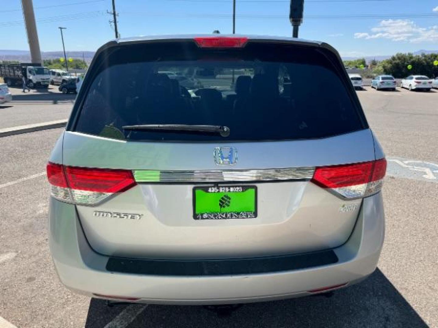 2014 Alabaster Silver Metallic /Beige Honda Odyssey EX-L (5FNRL5H62EB) with an 3.5L V6 SOHC 24V engine, 6-Speed Automatic transmission, located at 940 North Main Street, Cedar City, UT, 84720, (435) 628-0023, 37.692936, -113.061897 - We specialize in helping ALL people get the best financing available. No matter your credit score, good, bad or none we can get you an amazing rate. Had a bankruptcy, divorce, or repossessions? We give you the green light to get your credit back on the road. Low down and affordable payments that fit - Photo#5