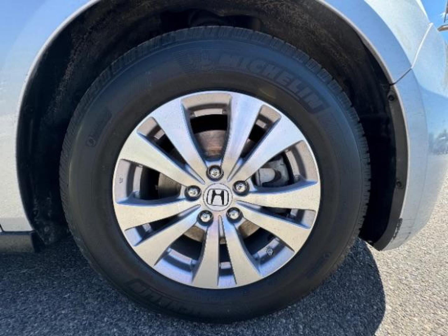 2014 Alabaster Silver Metallic /Beige Honda Odyssey EX-L (5FNRL5H62EB) with an 3.5L V6 SOHC 24V engine, 6-Speed Automatic transmission, located at 940 North Main Street, Cedar City, UT, 84720, (435) 628-0023, 37.692936, -113.061897 - We specialize in helping ALL people get the best financing available. No matter your credit score, good, bad or none we can get you an amazing rate. Had a bankruptcy, divorce, or repossessions? We give you the green light to get your credit back on the road. Low down and affordable payments that fit - Photo#8