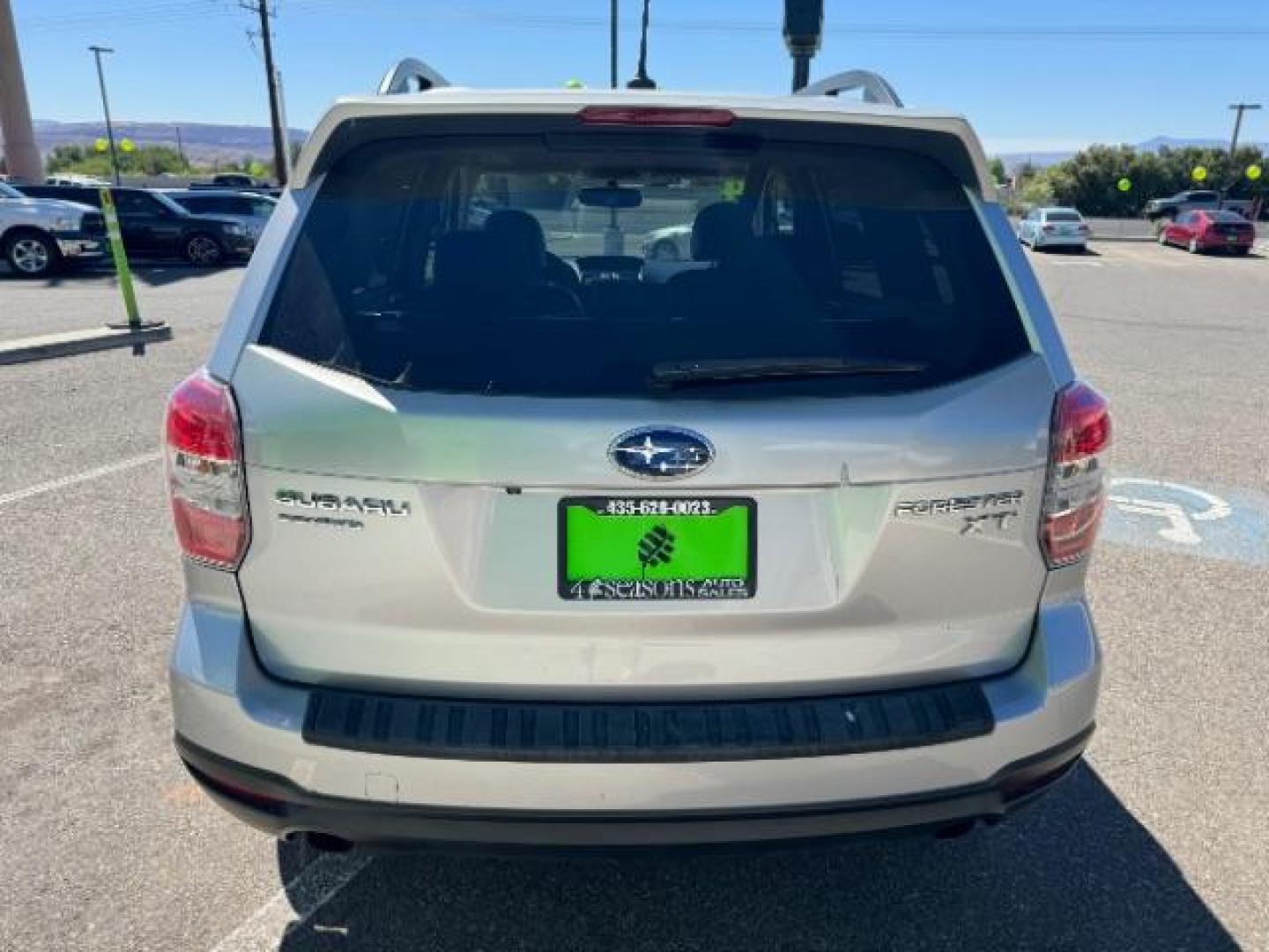 2014 Subaru Forester 2.0XT Touring (JF2SJGMC2EH) with an 2.0L H4 SOHC 16V engine, Continuously Variable Transmission transmission, located at 940 North Main Street, Cedar City, UT, 84720, (435) 628-0023, 37.692936, -113.061897 - Photo#5