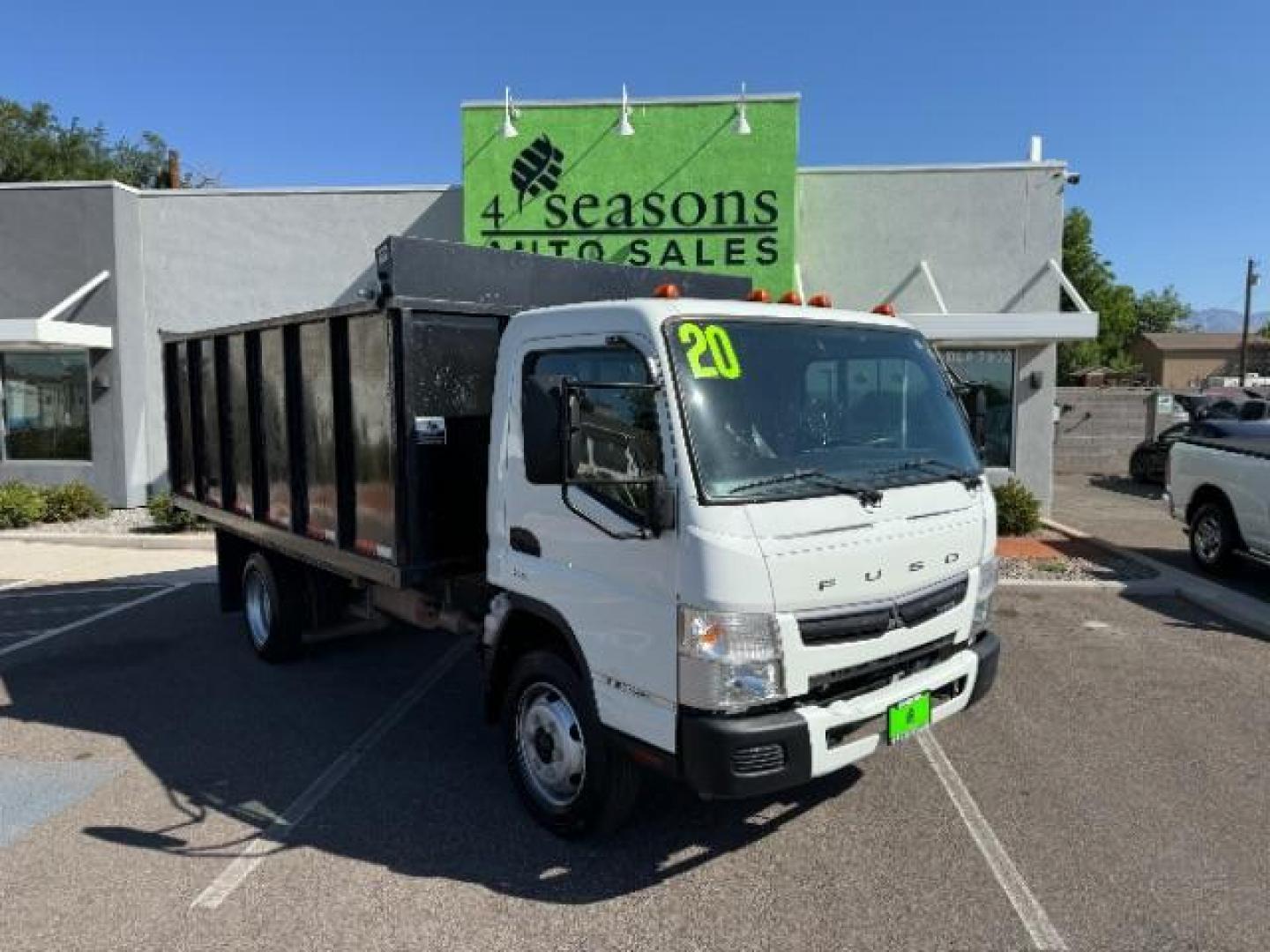 2020 White /Black Mitsubishi Fuso FE180 (4UZCXE119LG) with an 6L engine, Automatic transmission, located at 1865 East Red Hills Pkwy, St. George, 84770, (435) 628-0023, 37.120850, -113.543640 - Fuso FE180 dump truck. 26k miles. Runs a drives great! FE180 Dump Truck is a powerful and versatile commercial vehicle with a GVWR of 17,995 pounds. It is powered by the GMC 6.0L turbocharged V8 gas engine paired with an Allison 6-speed automatic transmission. Standard features include air conditi - Photo#0